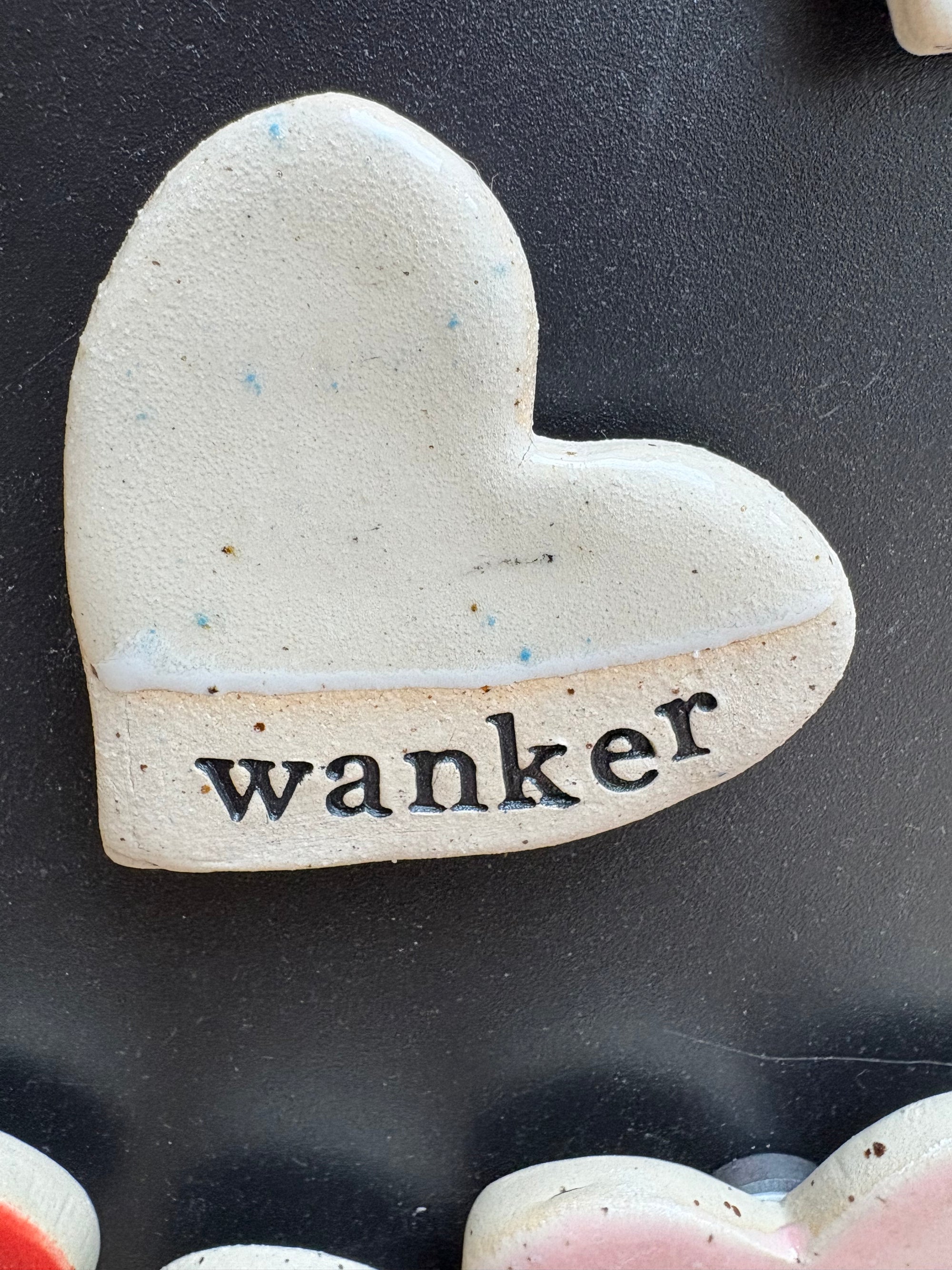 “wanker” Magnet (beige, large)