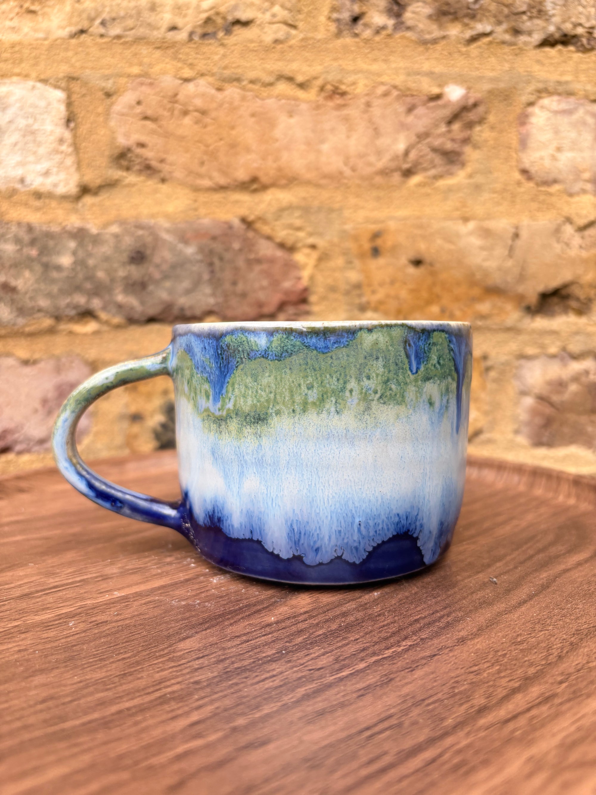 “What” “the fuck” mug (cream, blue/green)