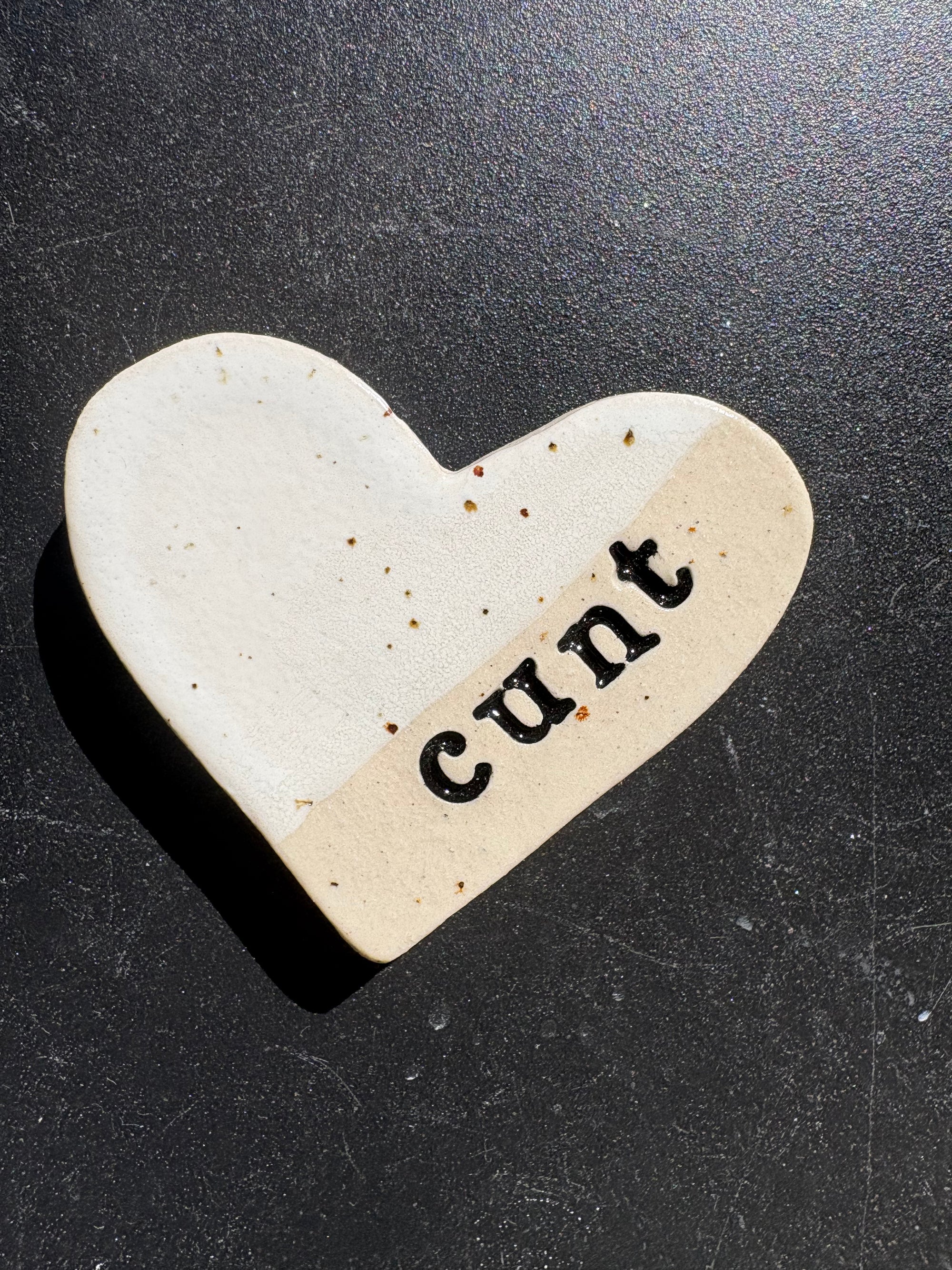 “cunt" magnet (white, medium)
