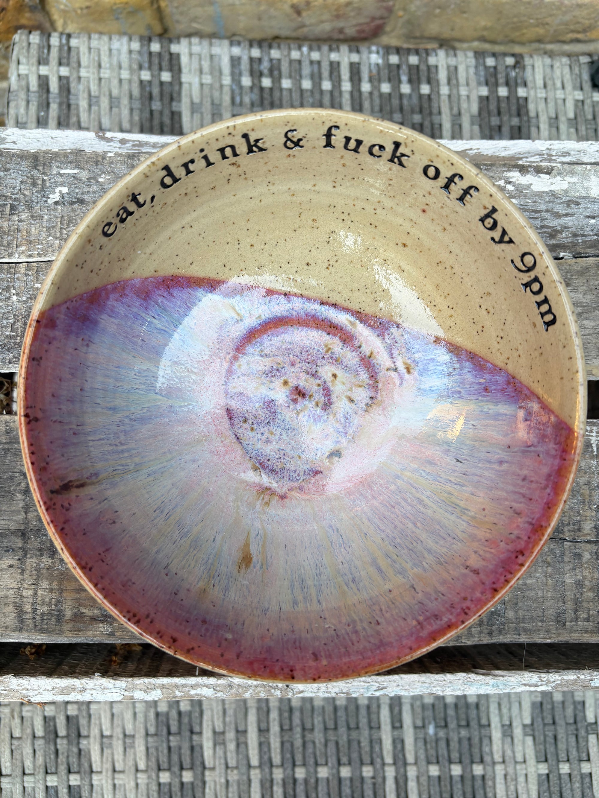 “eat, drink and fuck off by 9pm"  deep round salad/pasta bowl (pink, dark flecked clay)