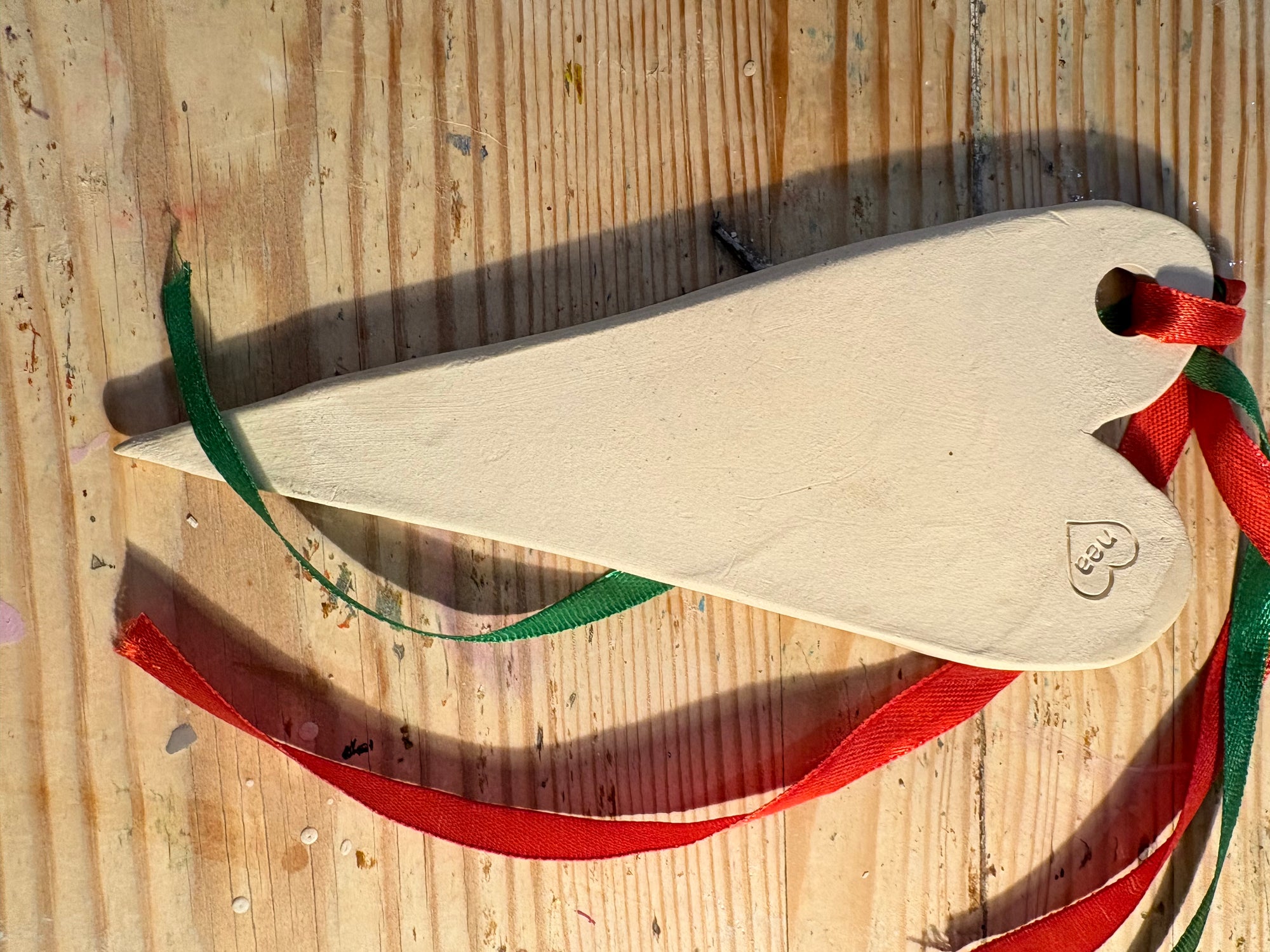 “merry xmas twat” hanging decoration (red and white, large)