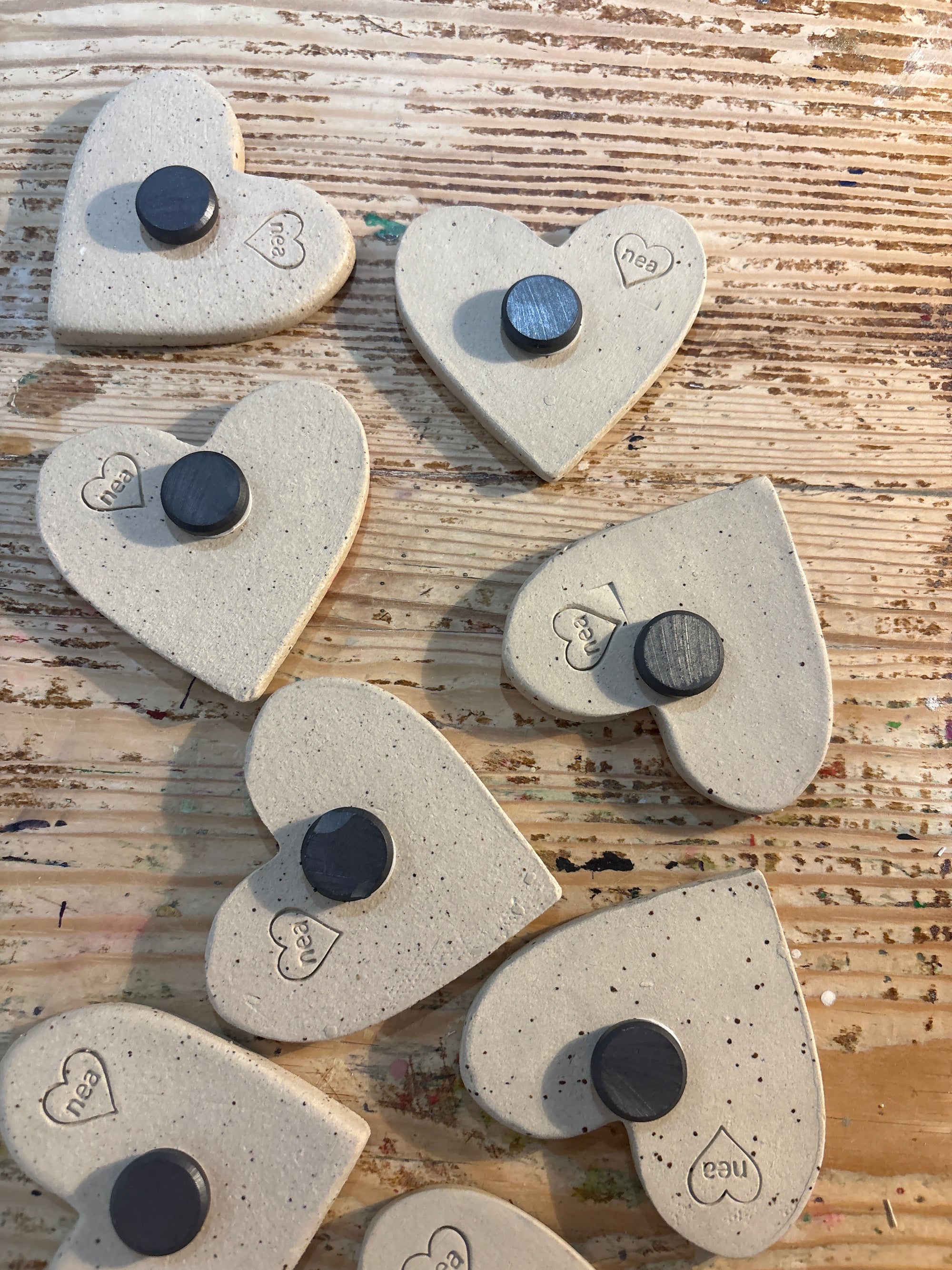 Twelve heart shaped Taylor Swift album magnets