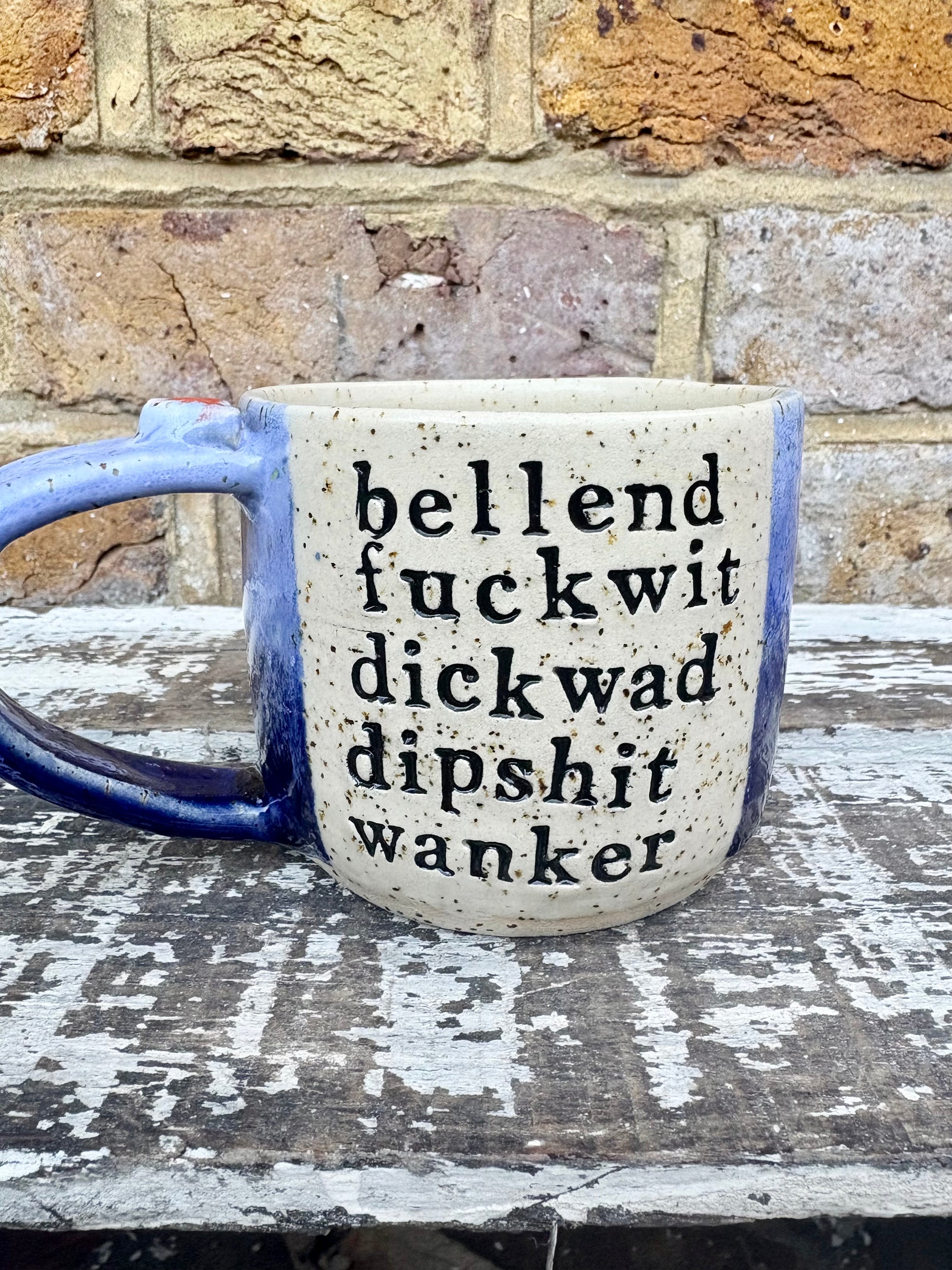 "bellend fuckwit dickwad dipshit wanker" mug (Blues)