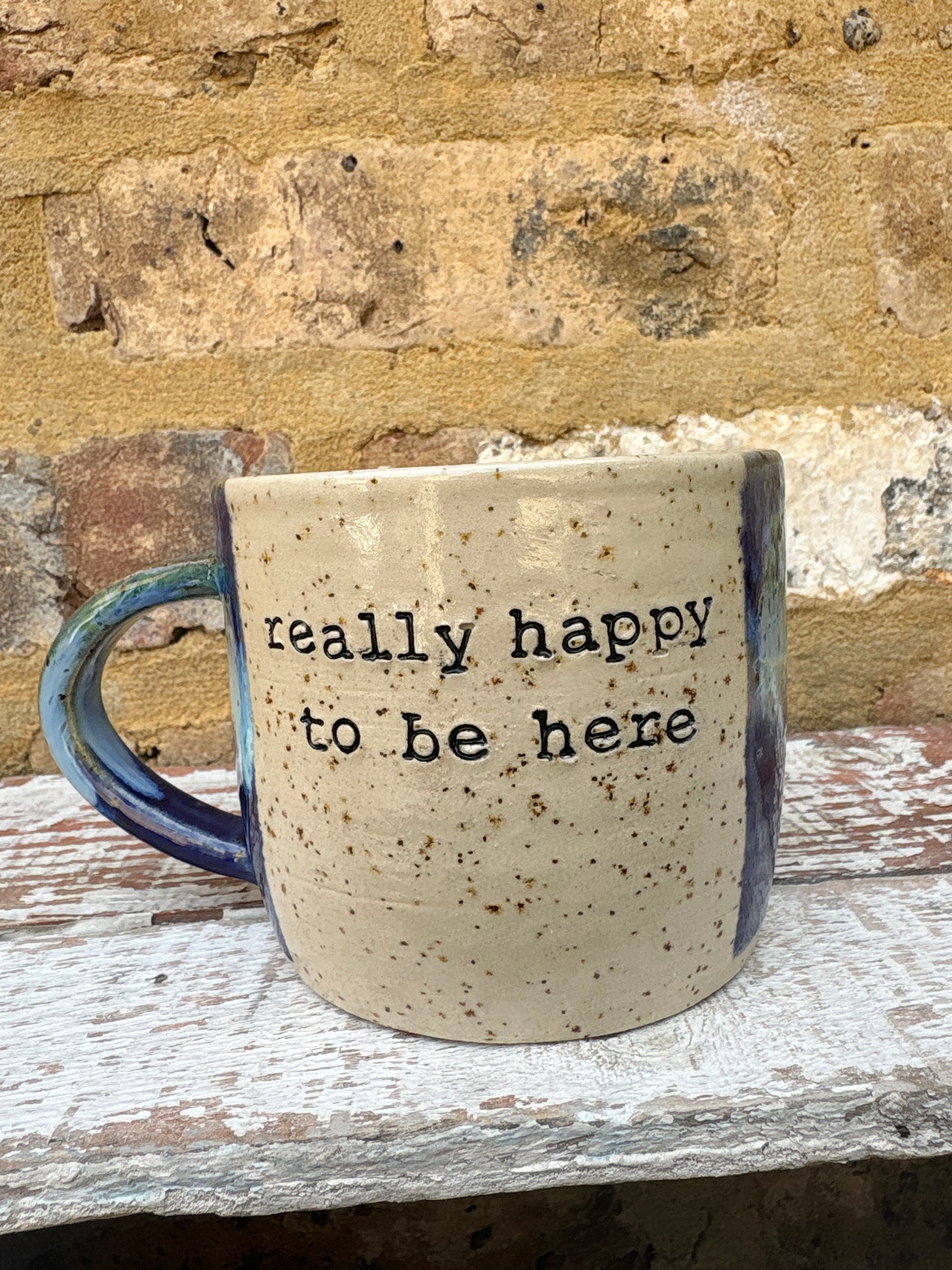 "really happy to be here” "what a bunch of cunts" mug (blue/green)