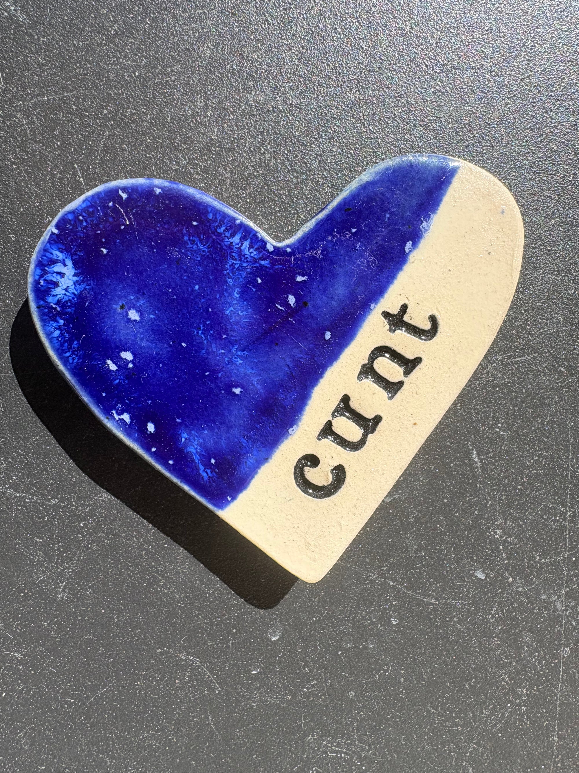 “cunt" magnet (blue, medium)