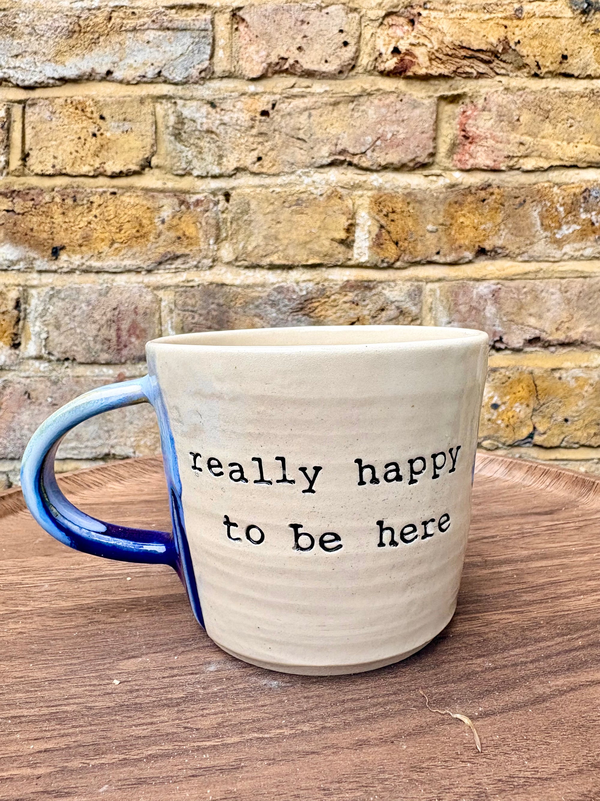 "really happy to be here” "what a bunch of cunts" mug (blues)