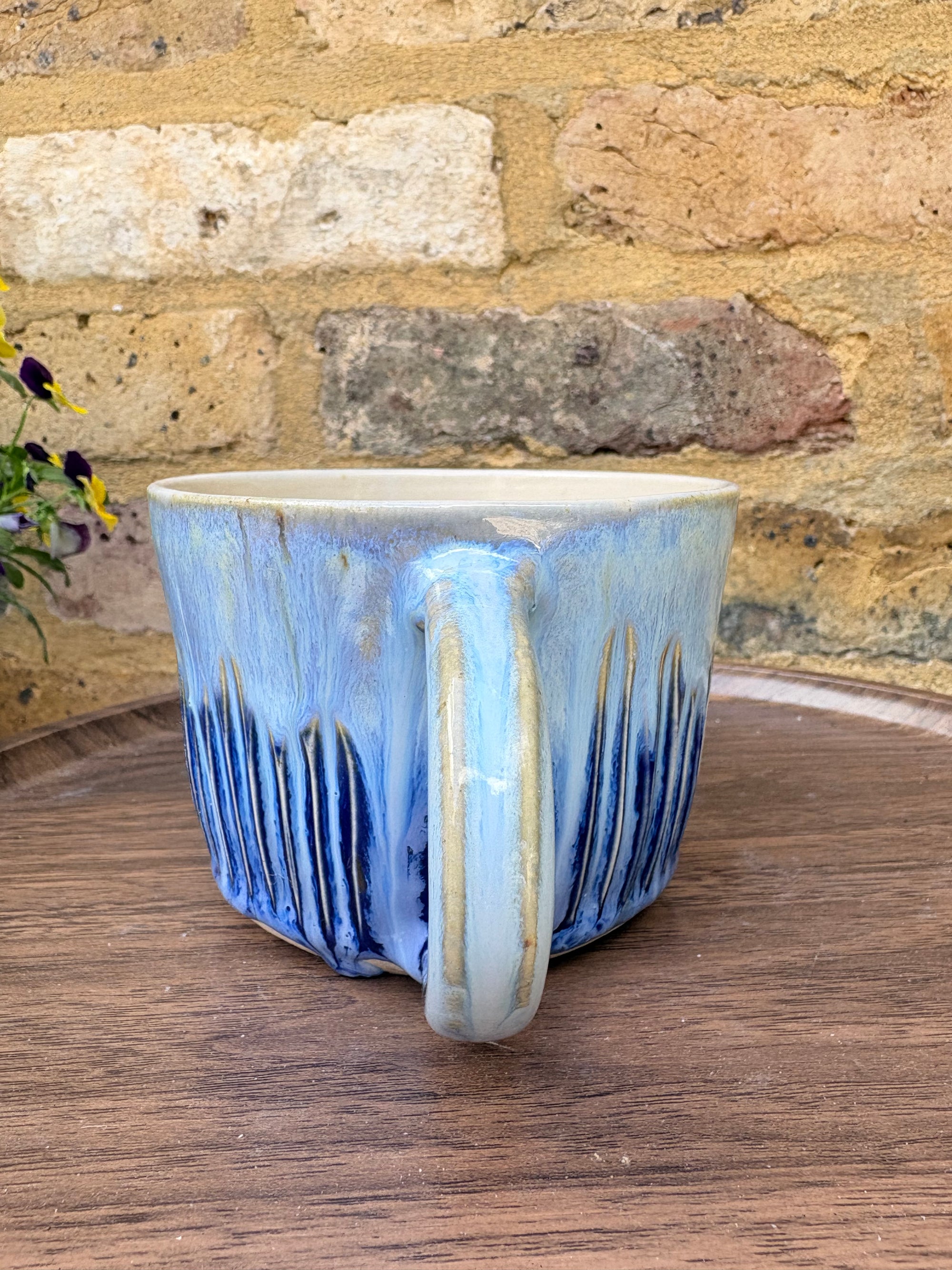 "cunt off fuck face” mug (blue, grooves)