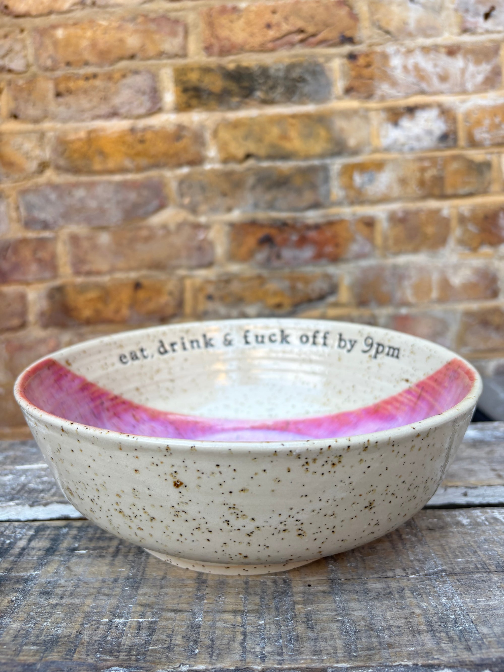 “eat, drink and fuck off by 9pm"  deep round salad/pasta bowl (lilac/pink, flecked clay)