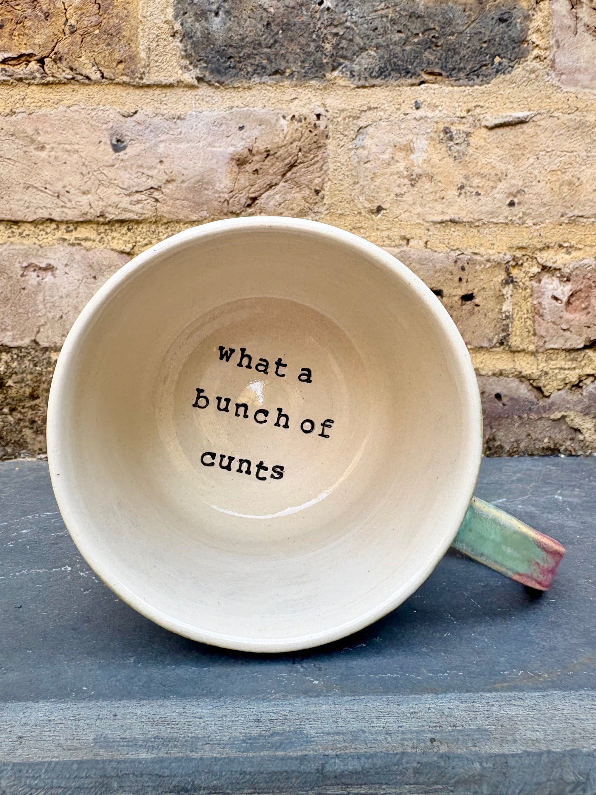 "really happy to be here” "what a bunch of cunts" mug (pink night sky)