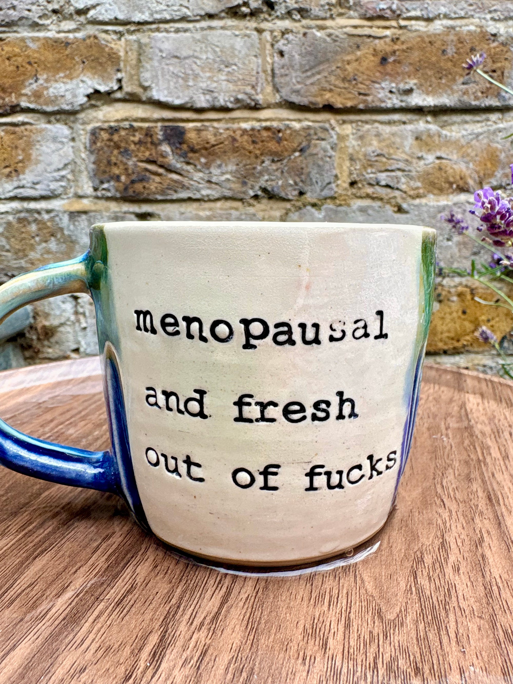 "menopausal and fresh out of fucks" mug (green/blue/ seconds)