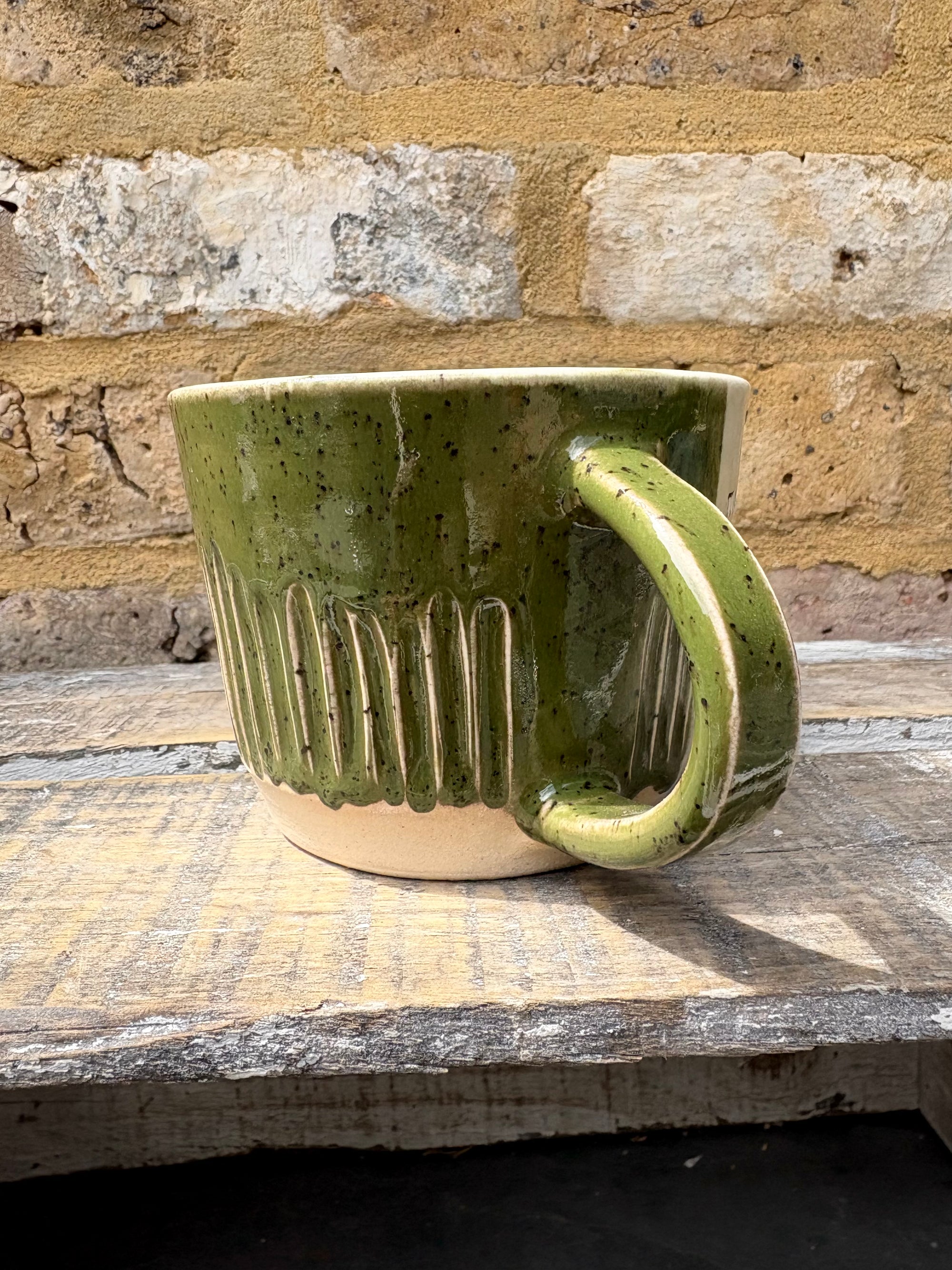 "menopausal and fresh out of fucks" mug (speckled green)