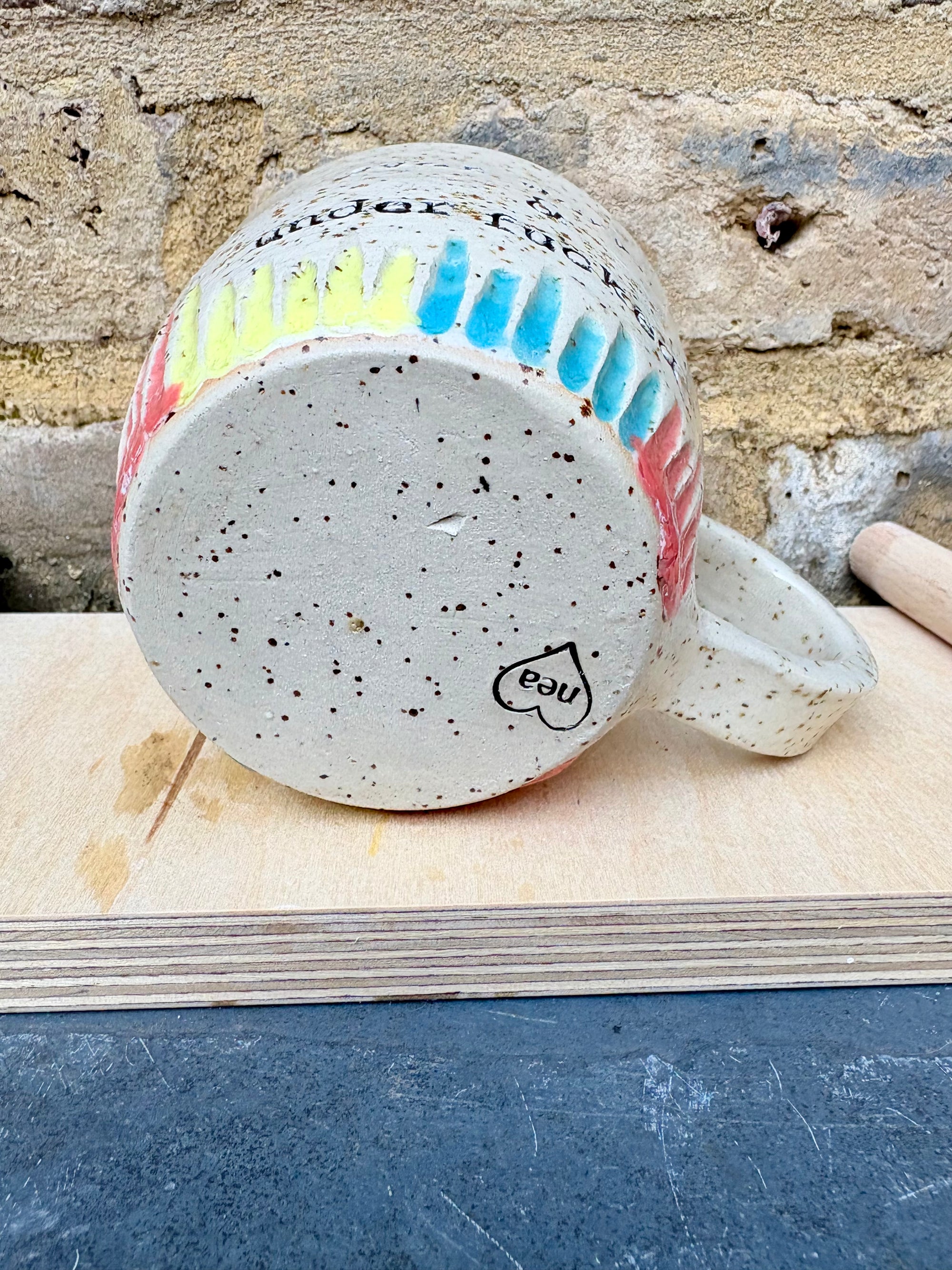 overworked and underfucked mug (multicoloured rainbow grooves)