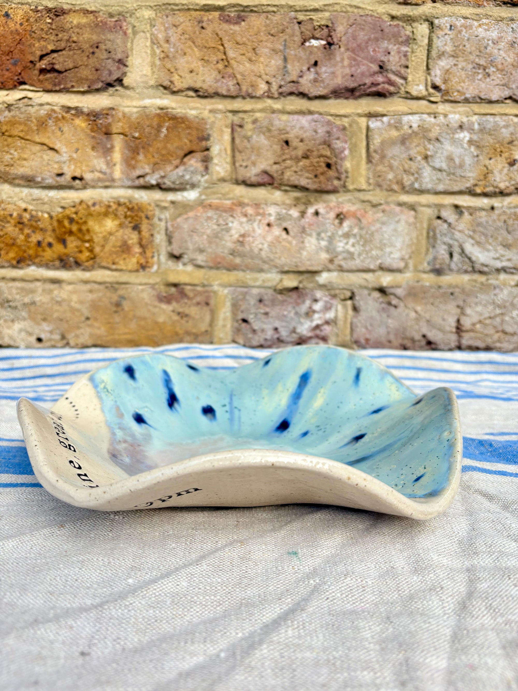 "good food, fine wine, great company..." serving dish