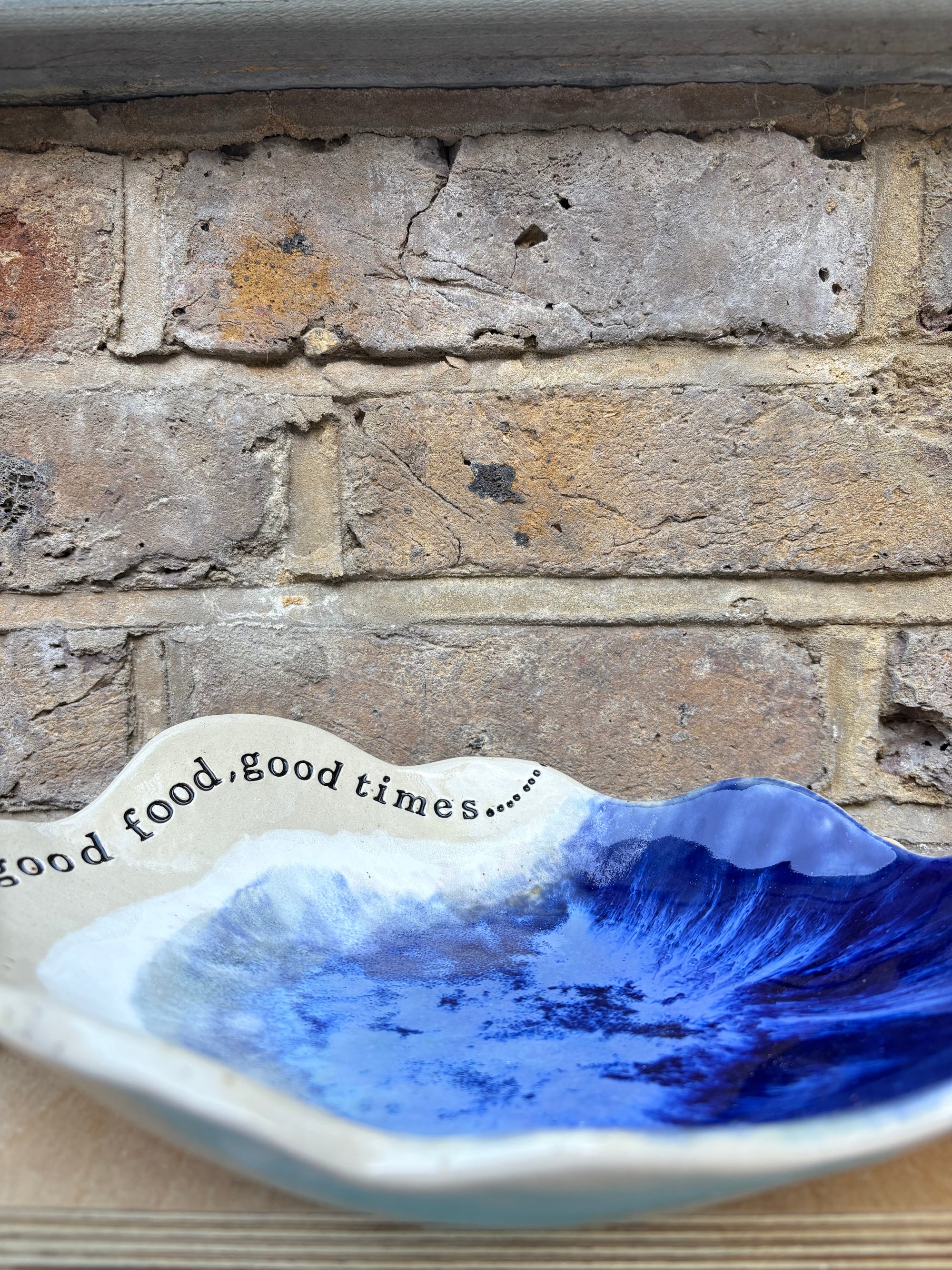 "good food, good wine, good times..." long salad dish