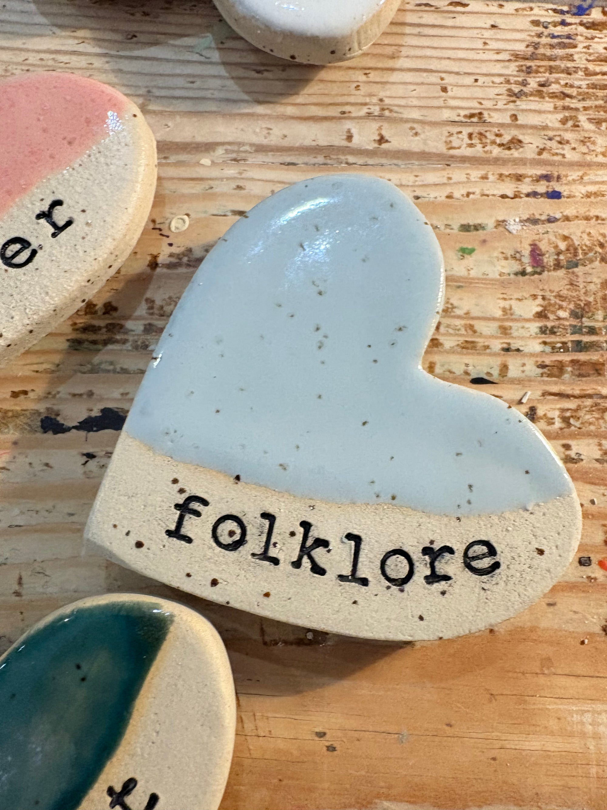 Twelve heart shaped Taylor Swift album magnets