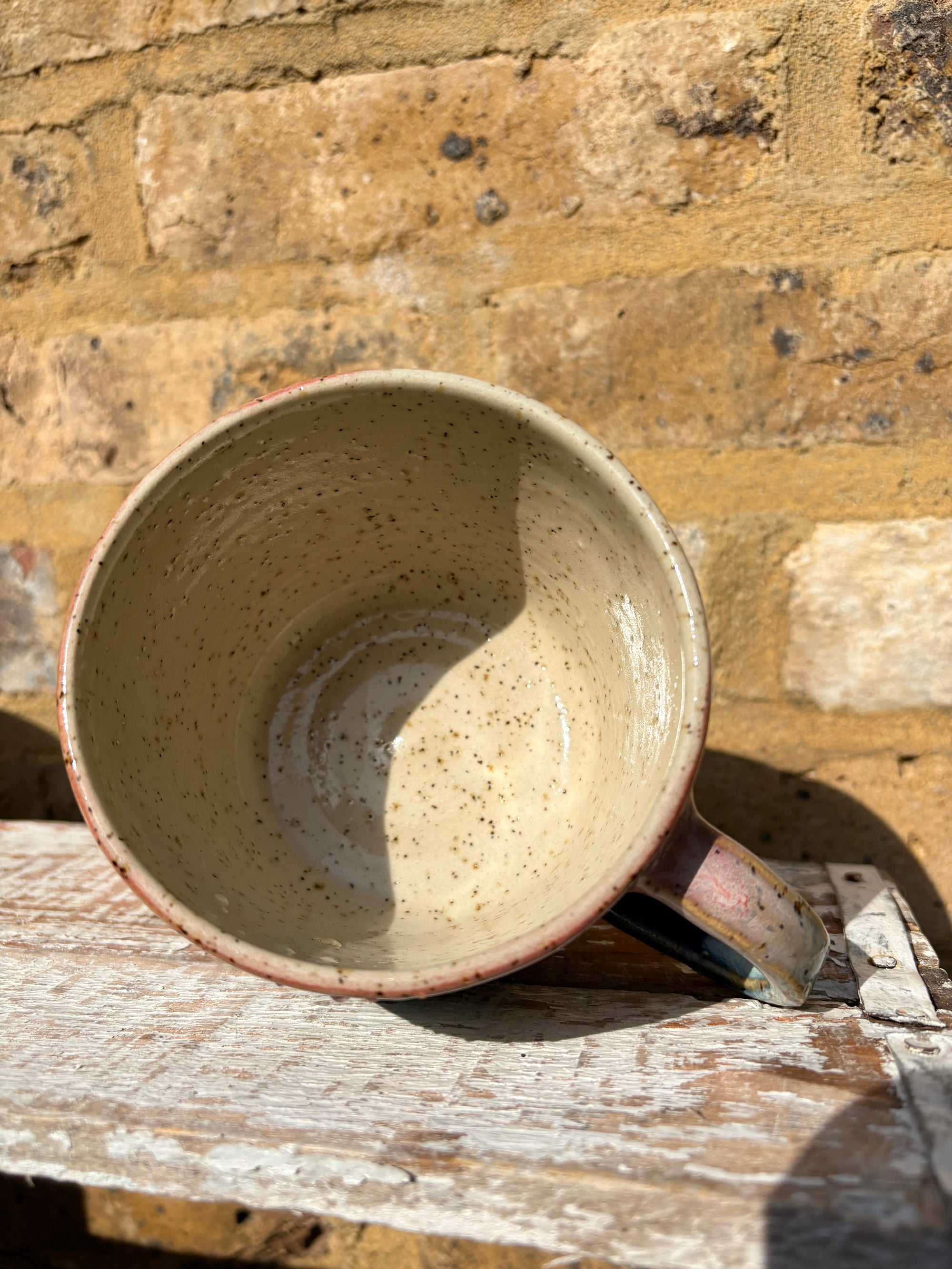 "please hesitate to reach out" mug (pink night sky)
