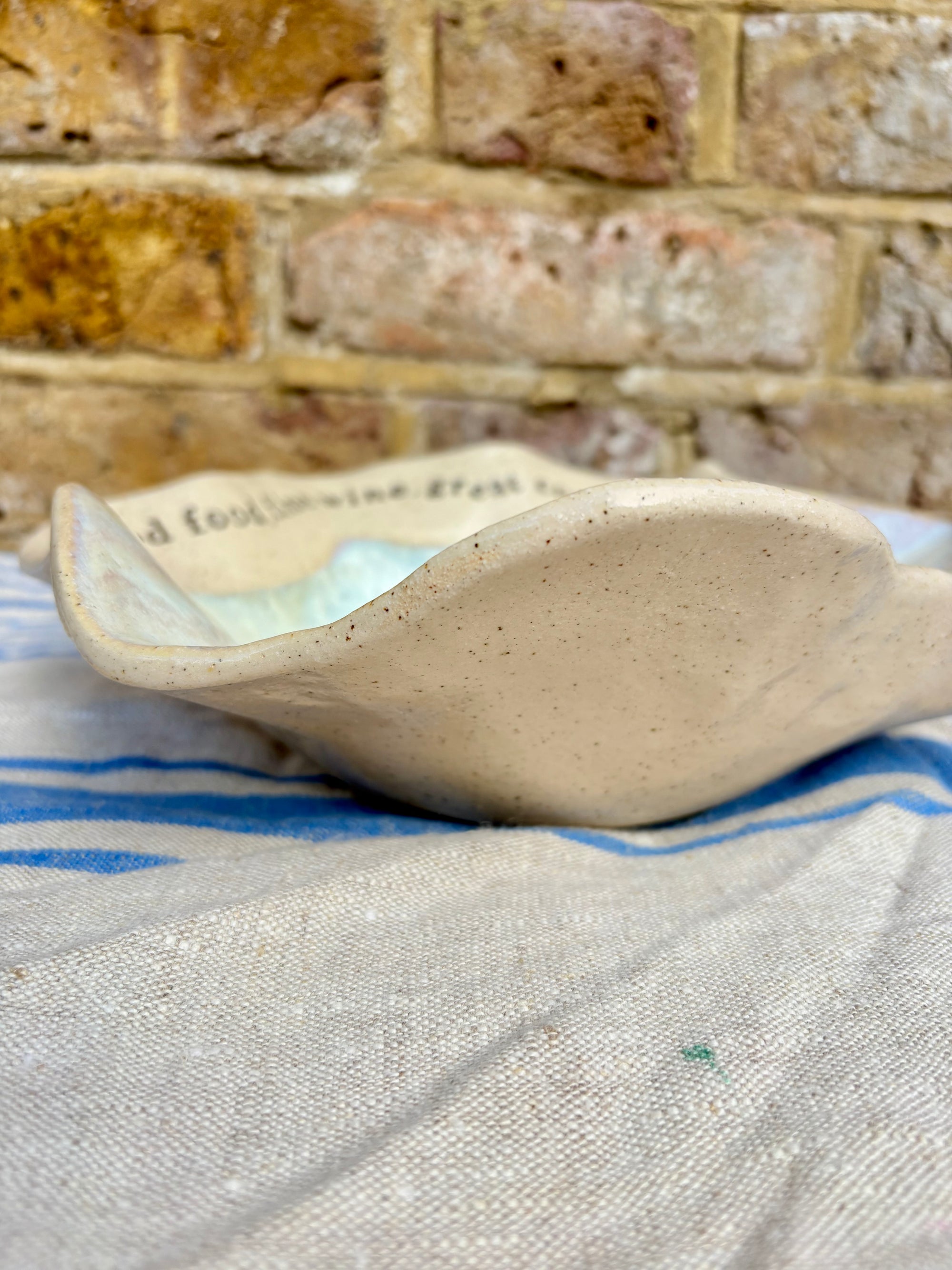 "good food, fine wine, great company..." serving dish