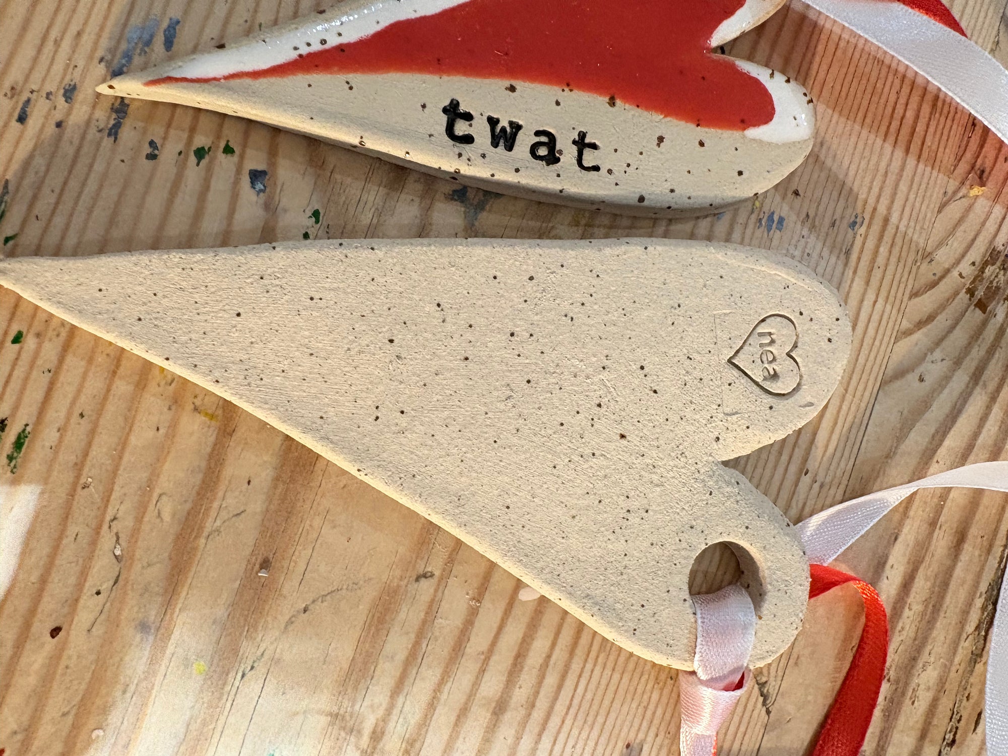“twat” hanging decoration (red and white, large)