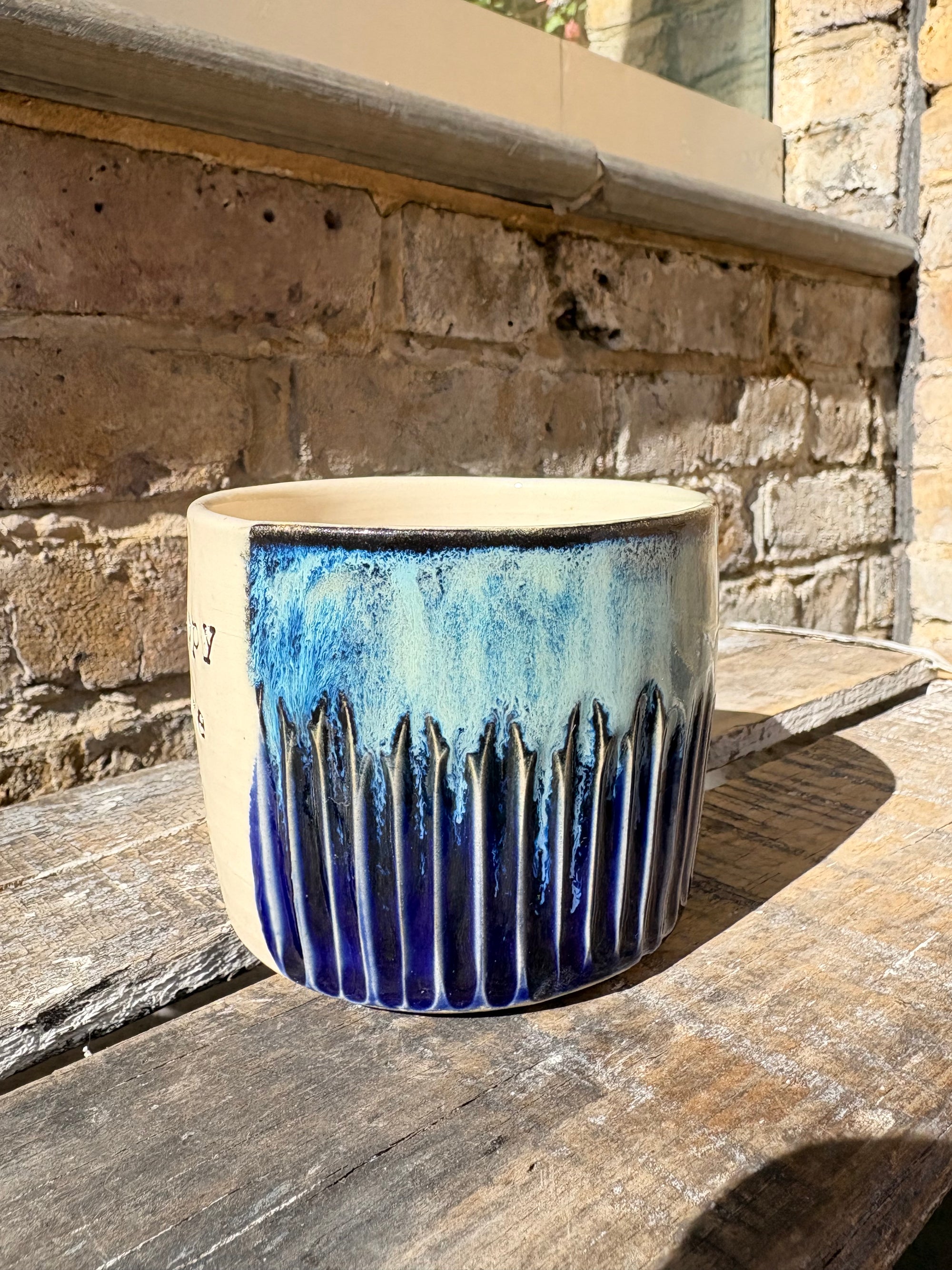 "really happy to be here” "what a bunch of cunts" mug (medium, blue shore)