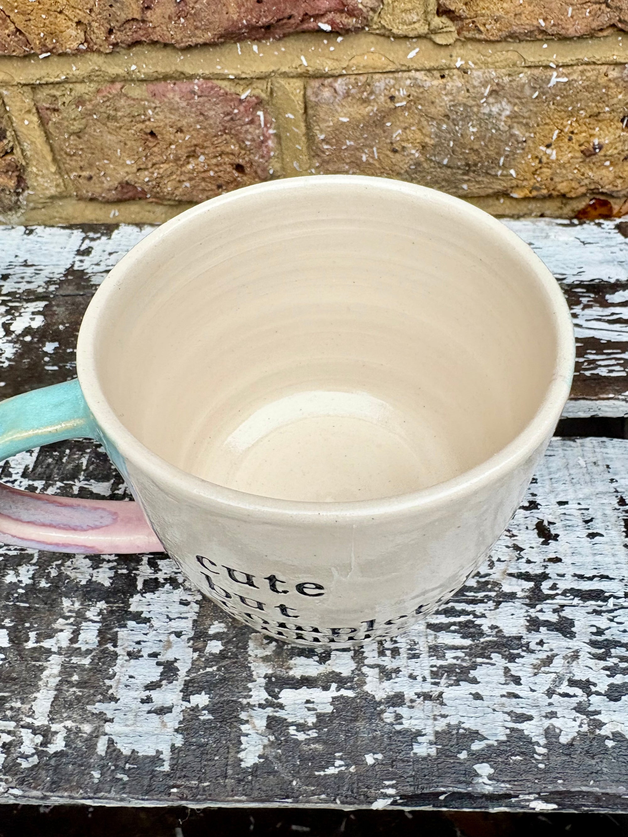 "cute but completely unhinged" mug