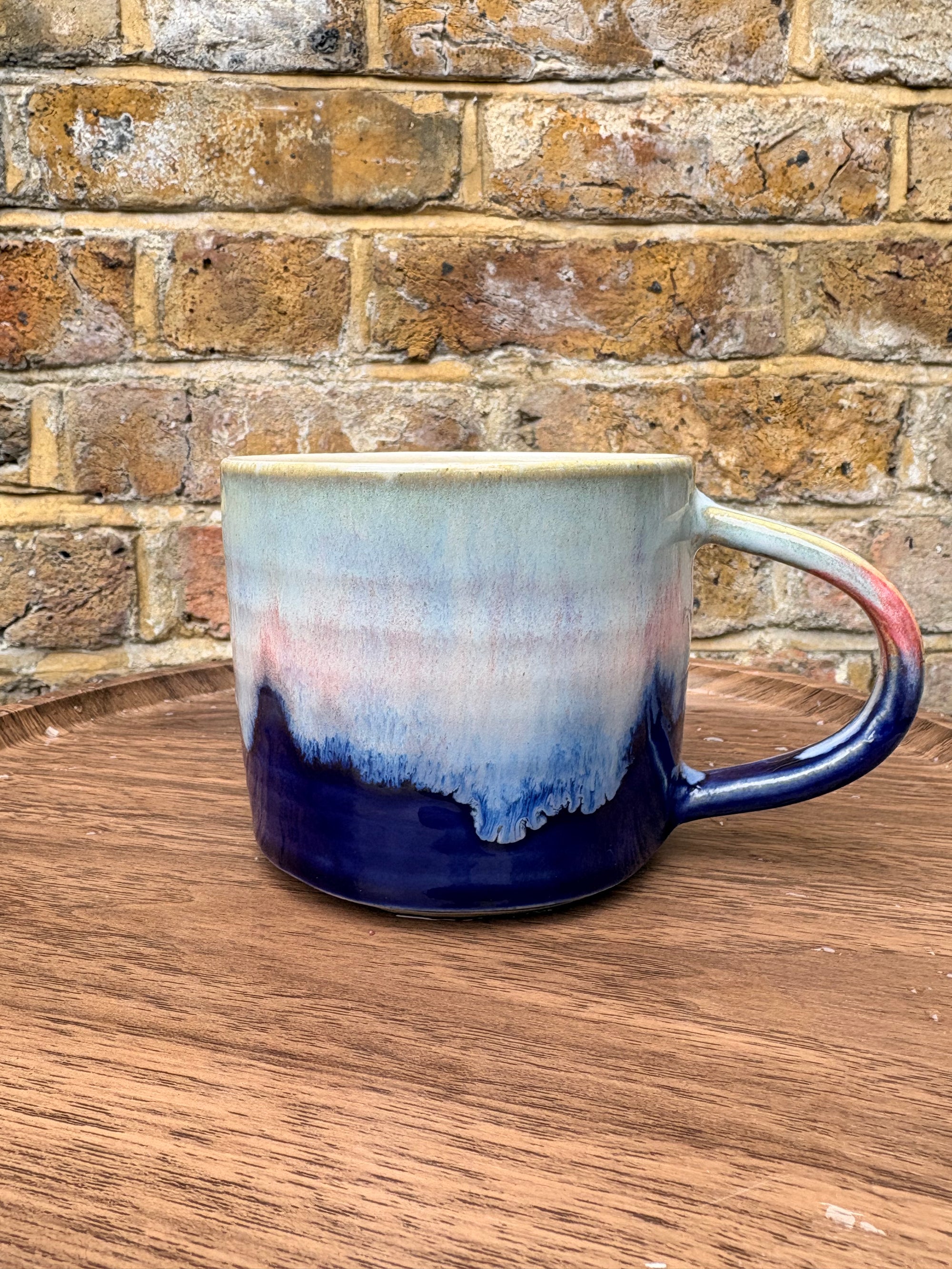“Biggest whore at the bookstore" mug (Pink/blue/cream)