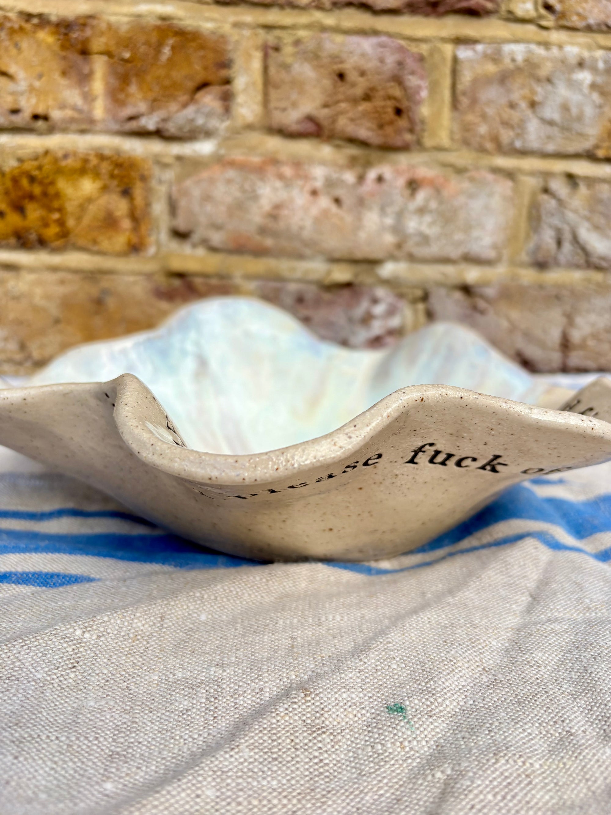 "good food, fine wine, great company..." serving dish