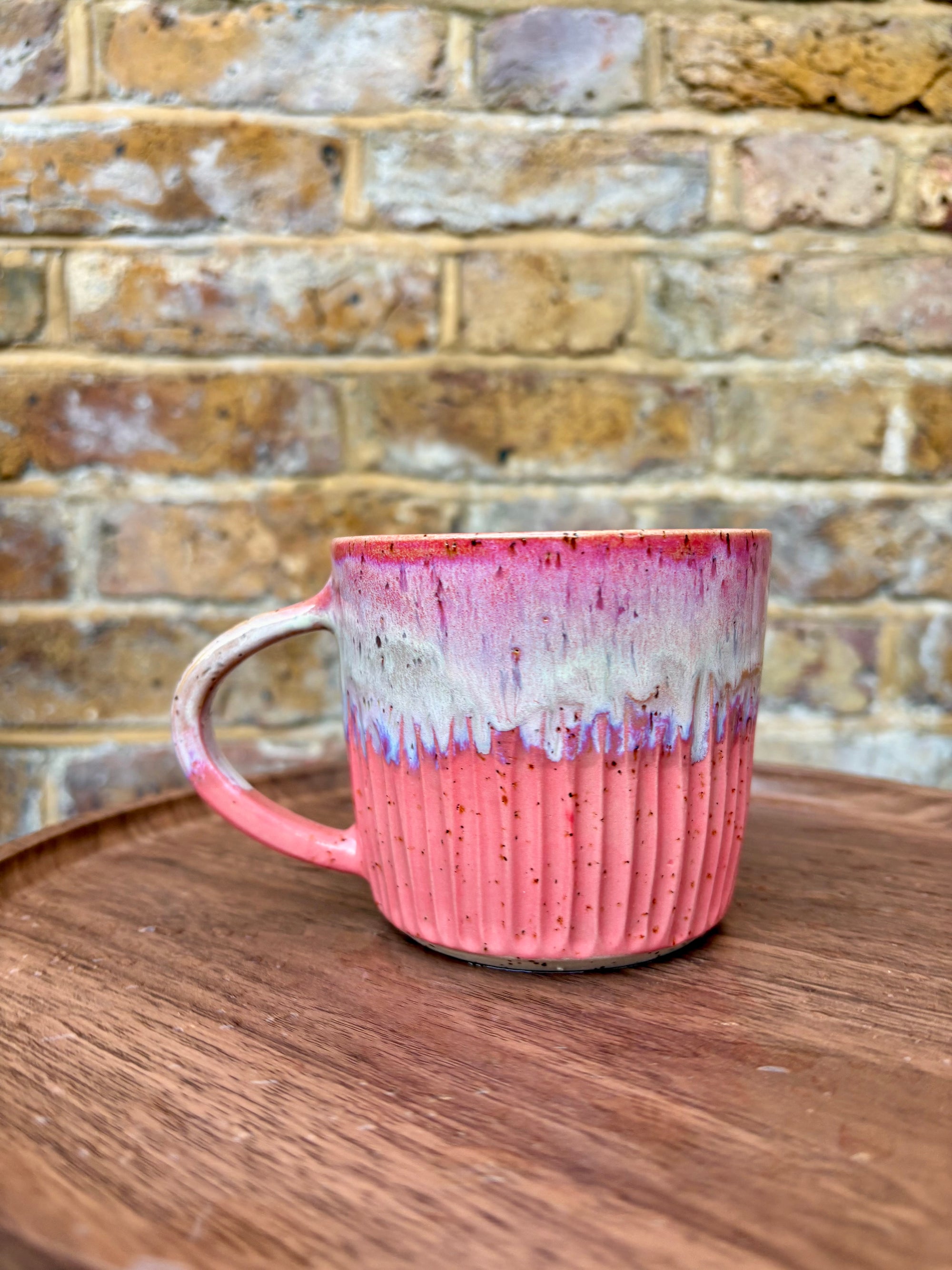 “FRAGILE (like a bomb) mug (pink, black text)