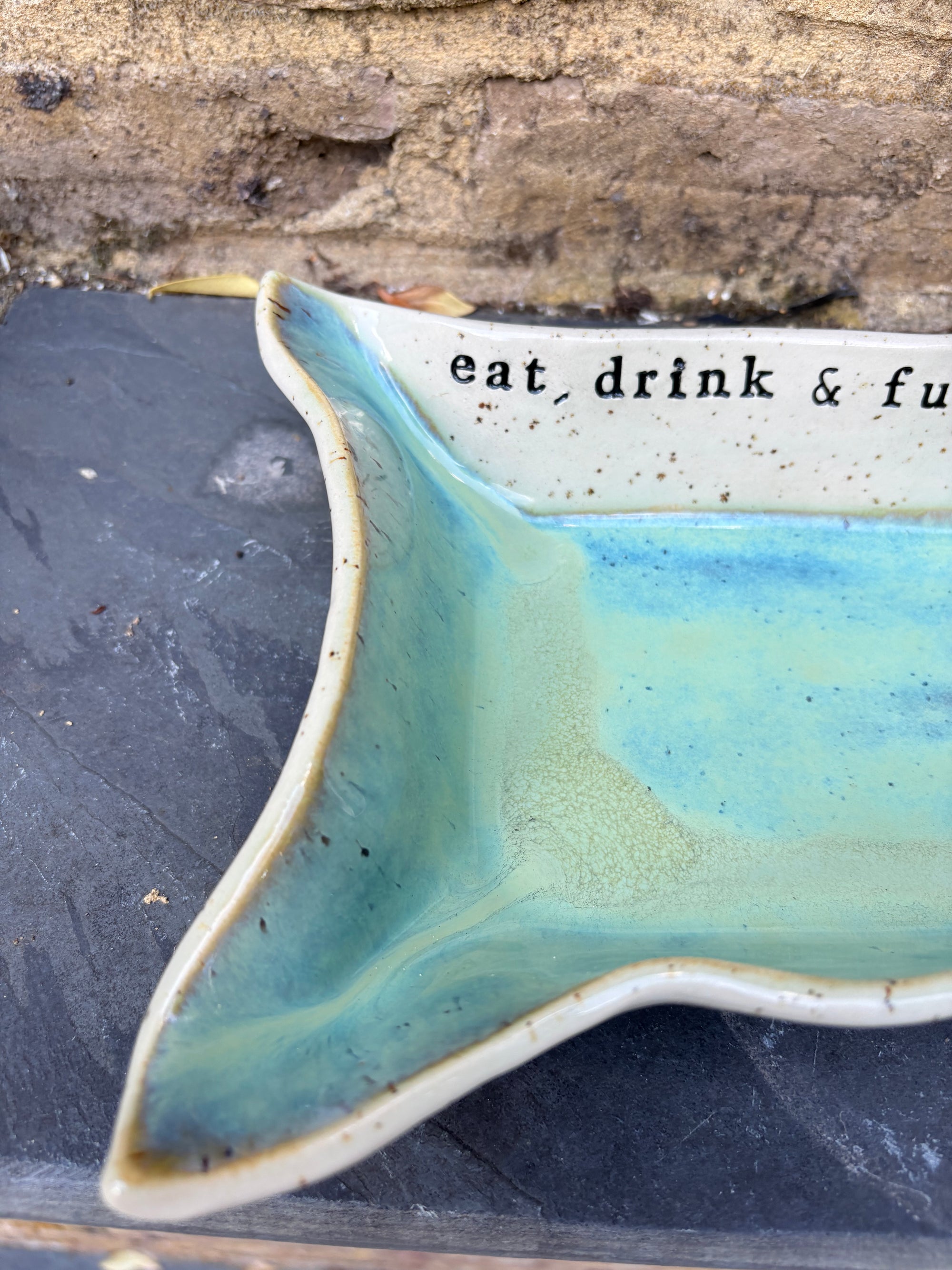“eat, drink and fuck off by 9pm" rectangular dish (green, flecked clay)