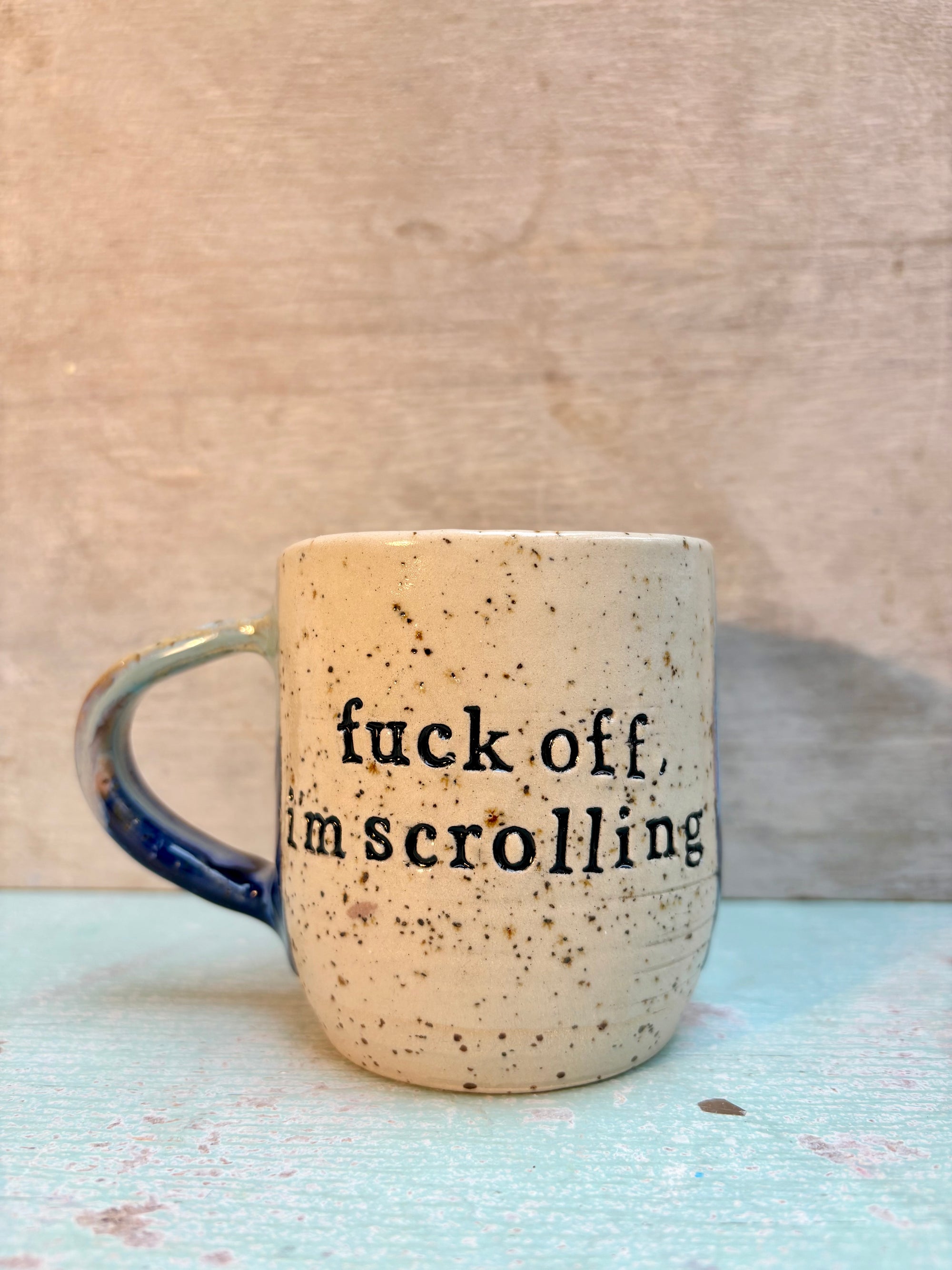 “Fuck off, i'm scrolling" mug