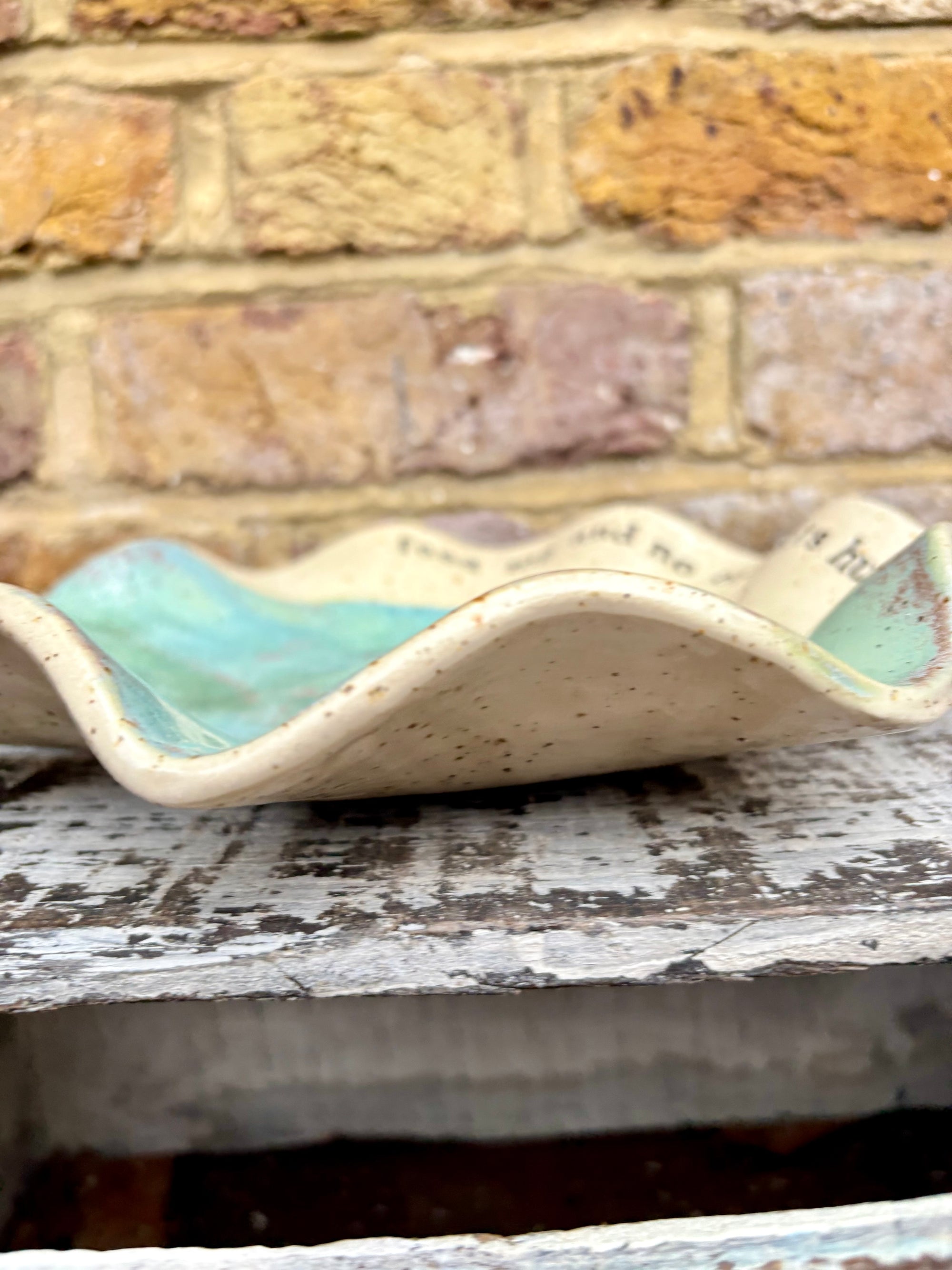 "feed me and no one gets hurt"  serving dish