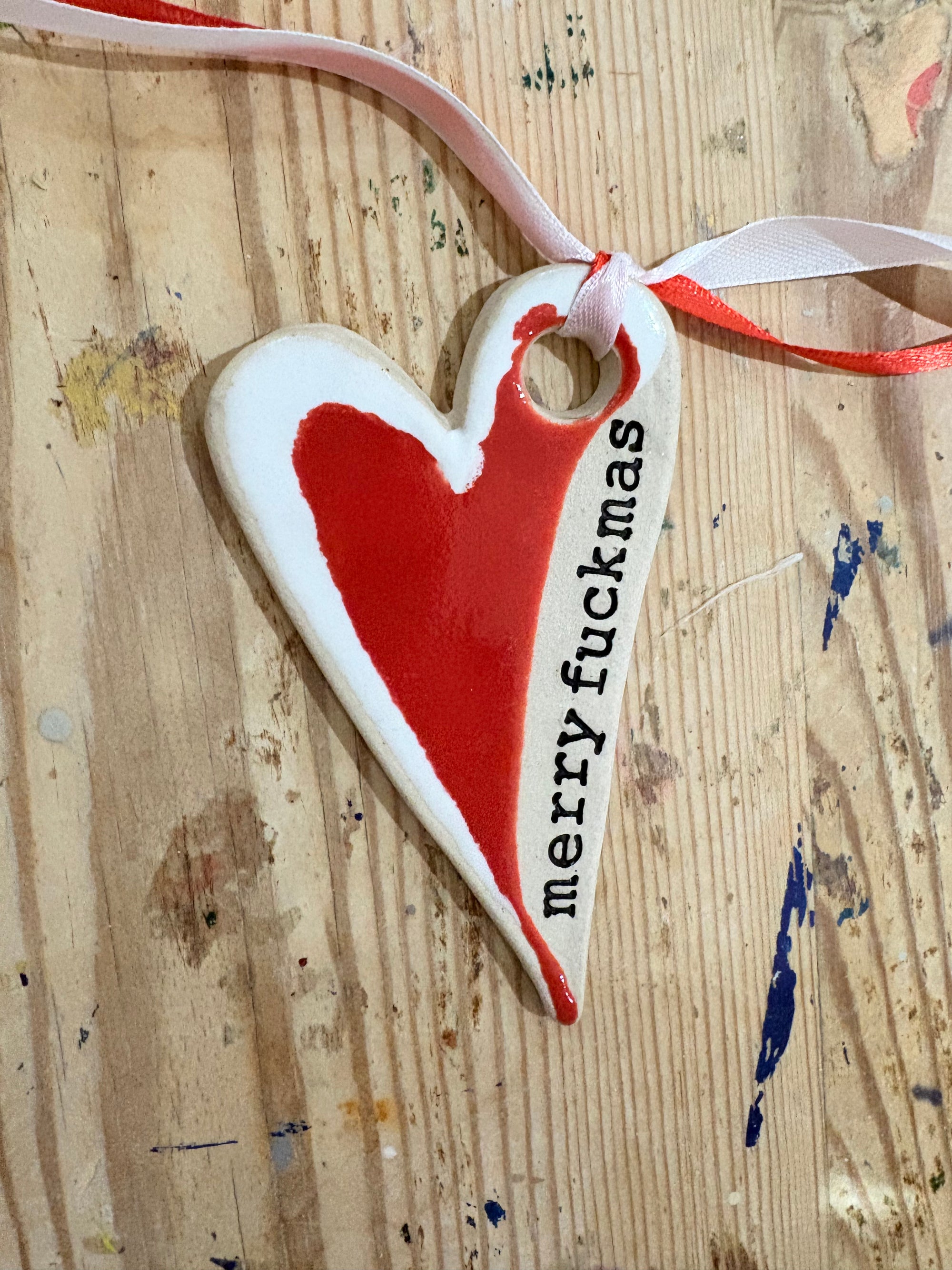“merry fuckmas” hanging decoration (red and white, larger)