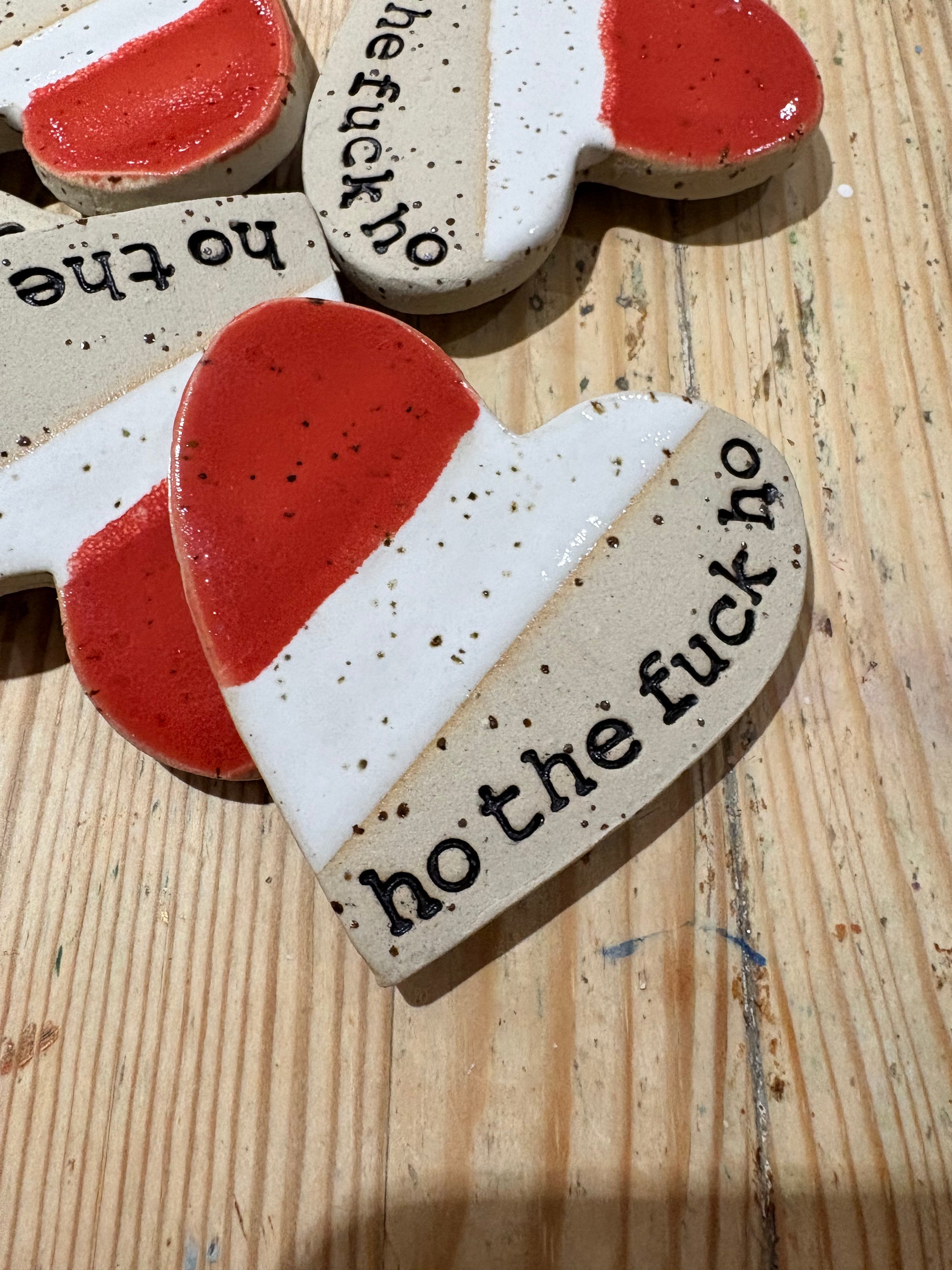 “ho the fuck ho” magnet (red and white, large)