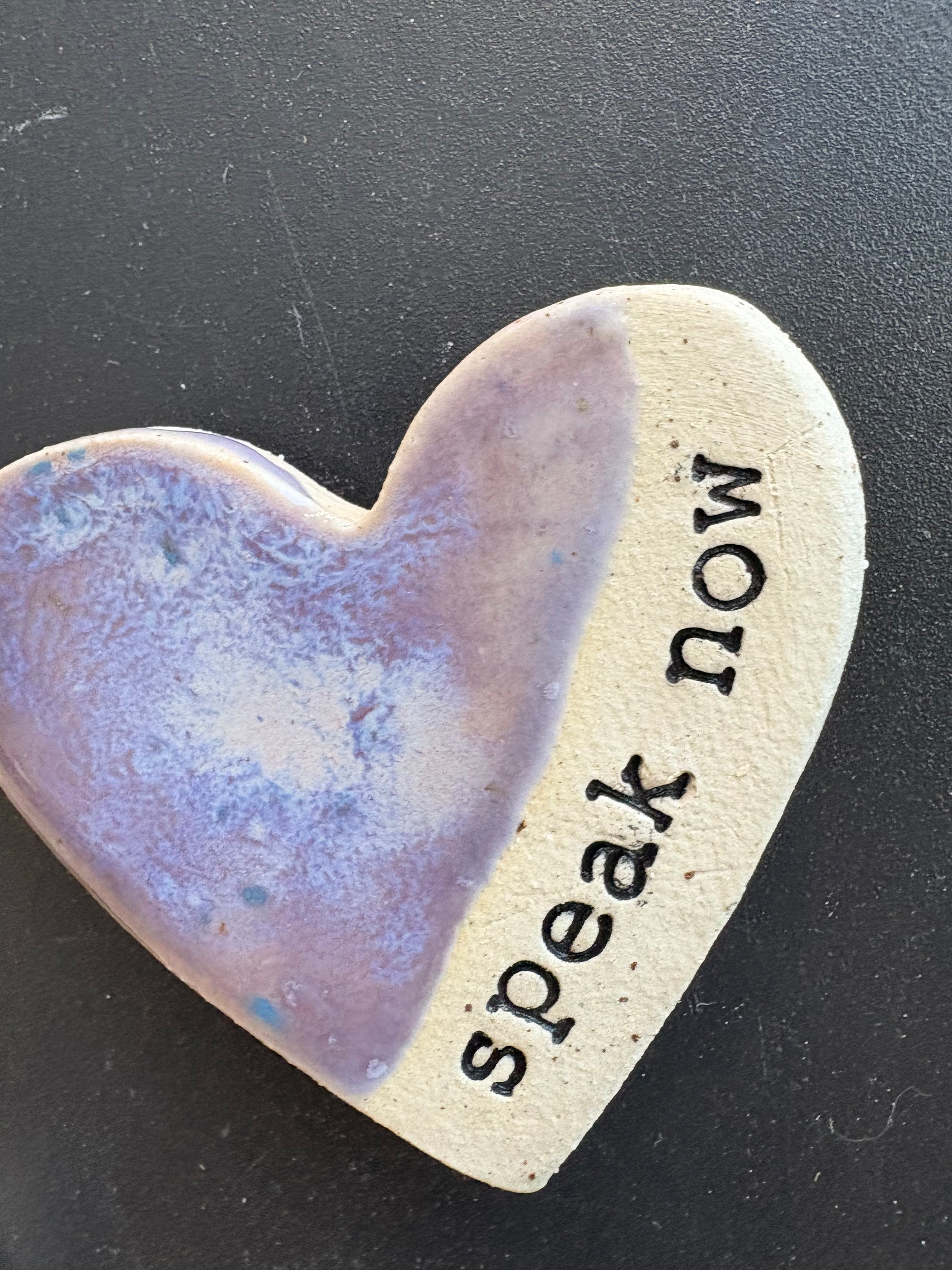 Twelve heart shaped Taylor Swift album magnets