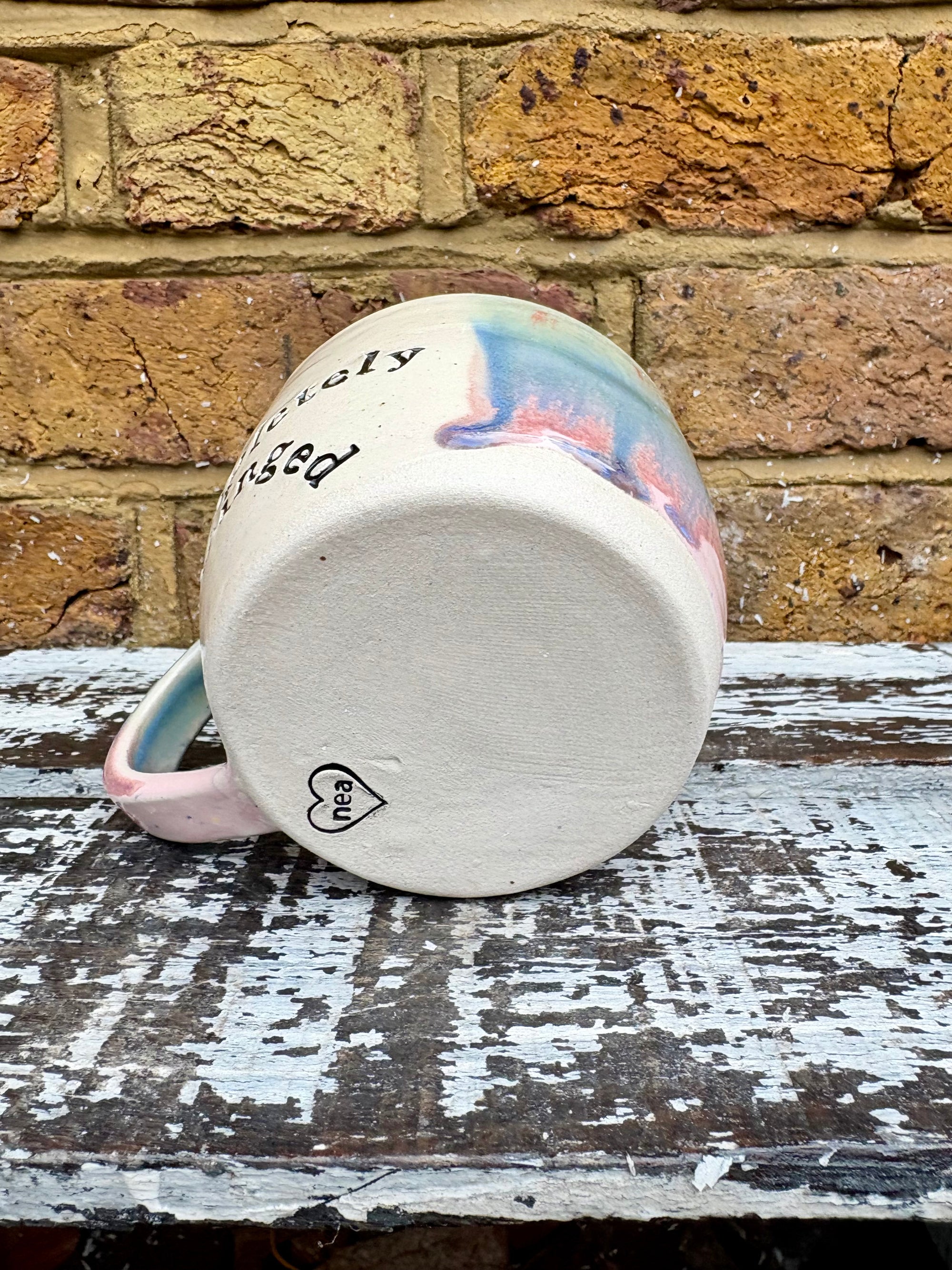 "cute but completely unhinged" mug