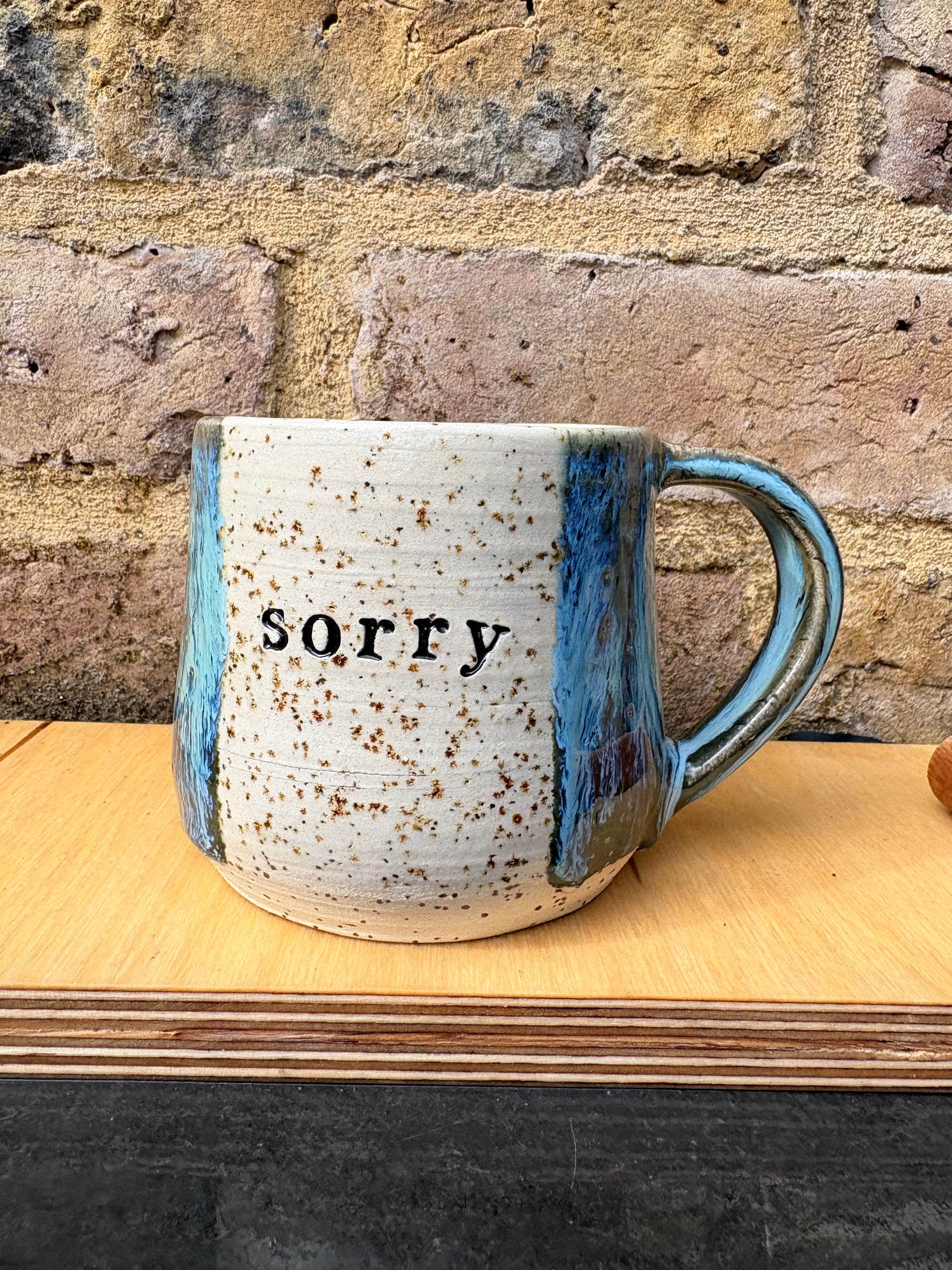 “Sorry" “not sorry” mug (blue night sky)
