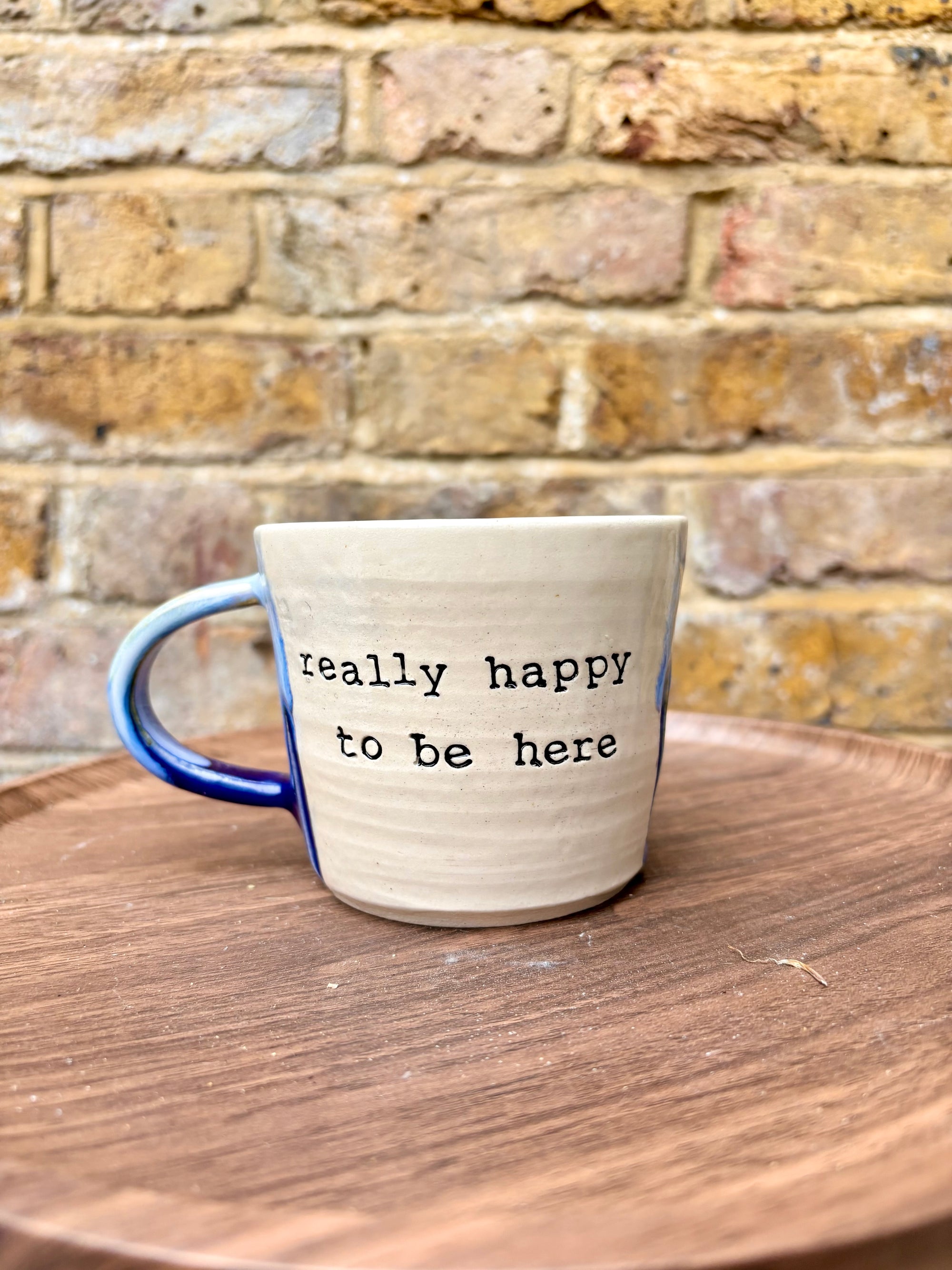 "really happy to be here” "what a bunch of cunts" mug (blues)