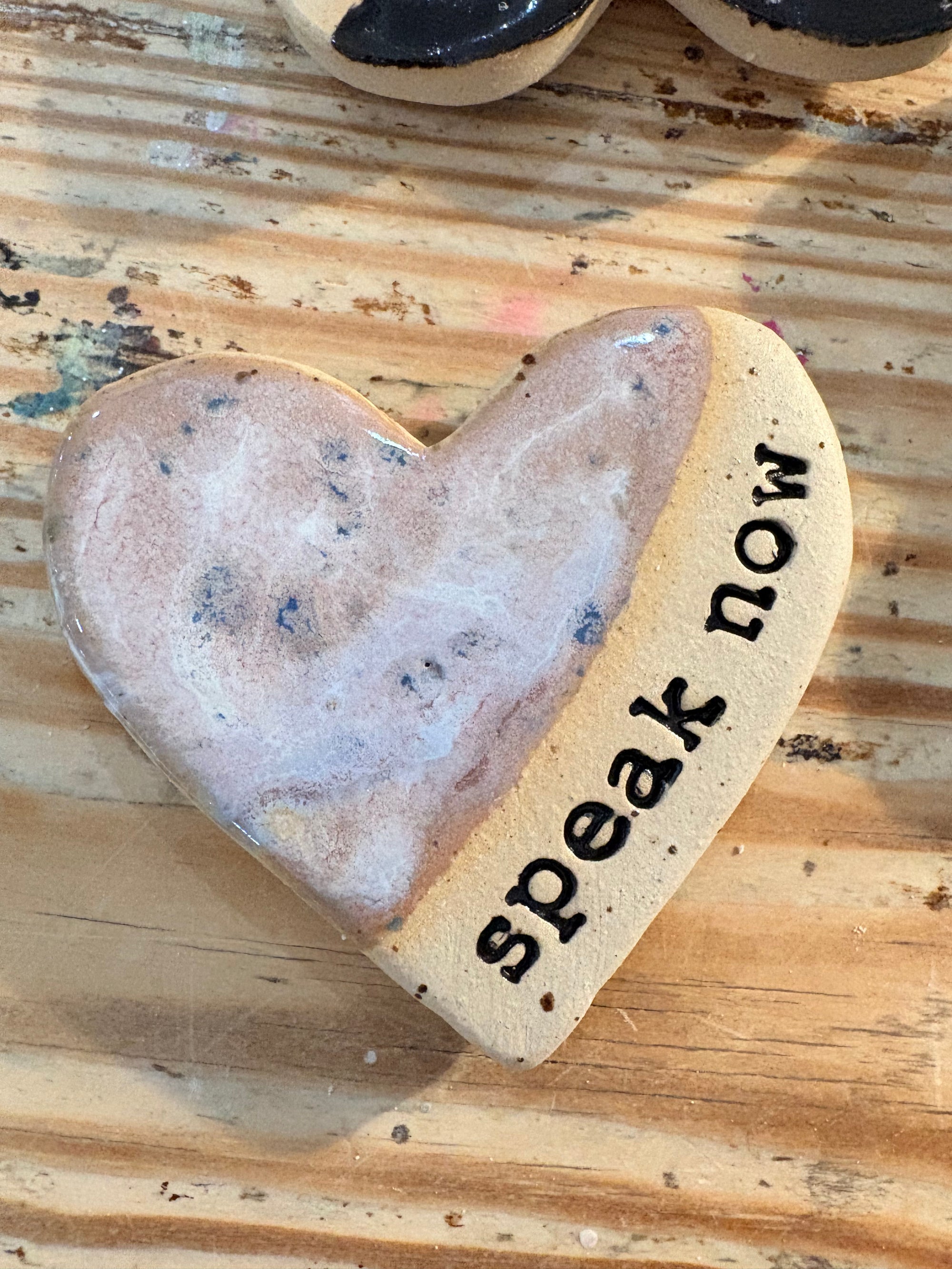 Twelve heart shaped Taylor Swift album magnets