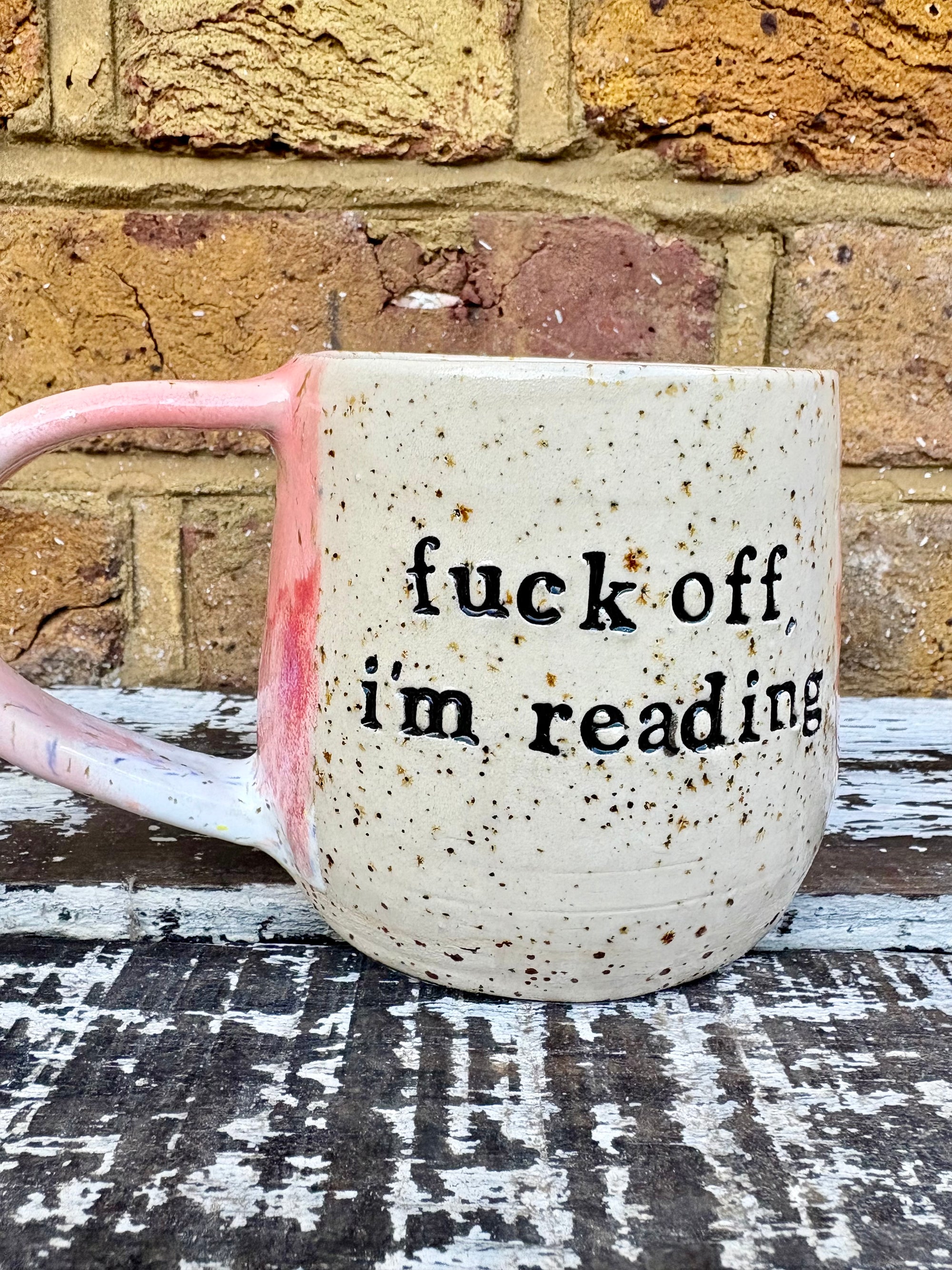 “Fuck off i'm reading" mug (Pink Raspberry Ripple)