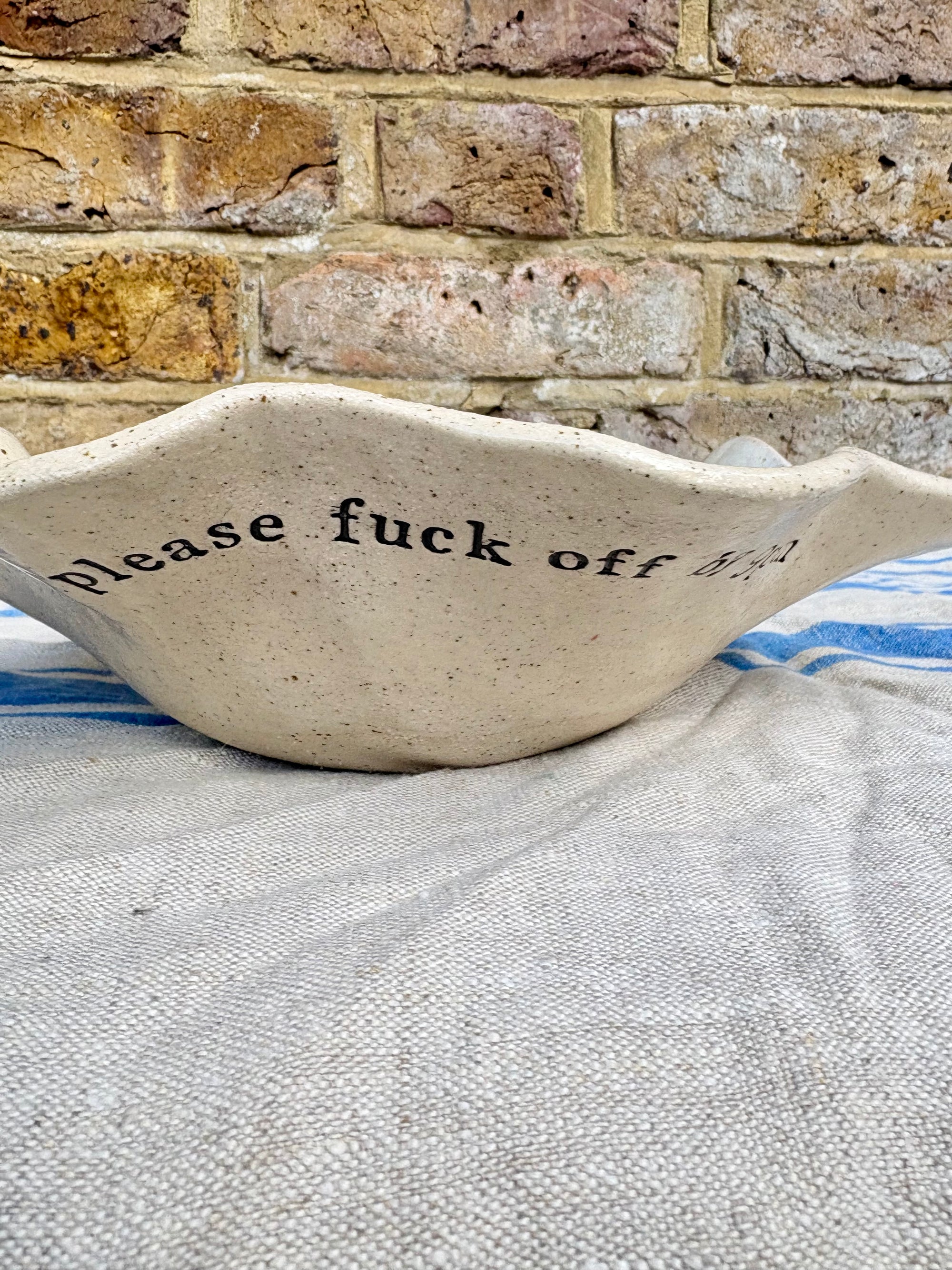 "good food, fine wine, great company..." serving dish