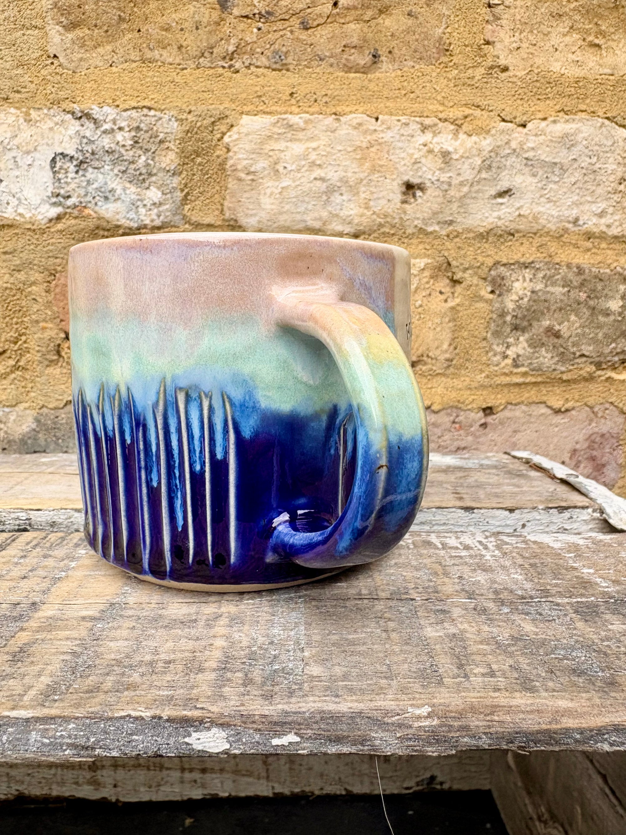 “what a fucked up time to be alive" mug (blue/ pink night sky)