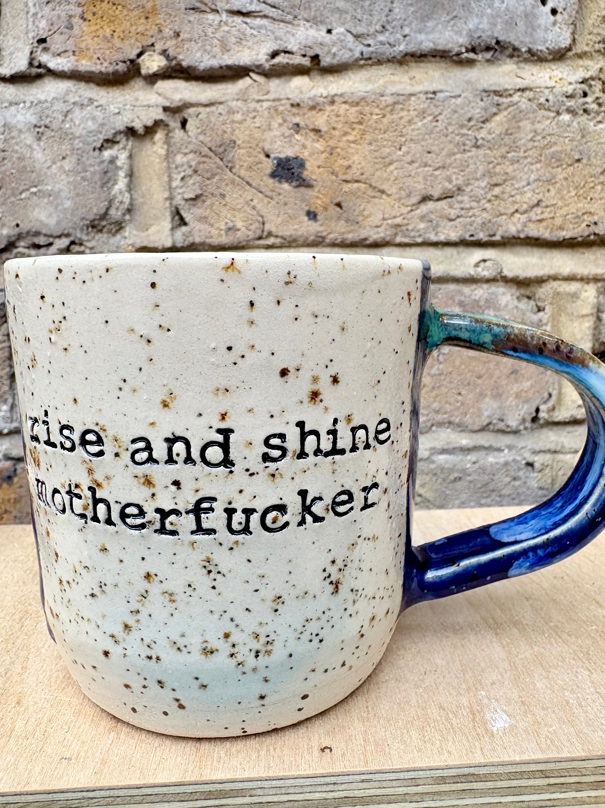"rise and shine motherfucker" mug