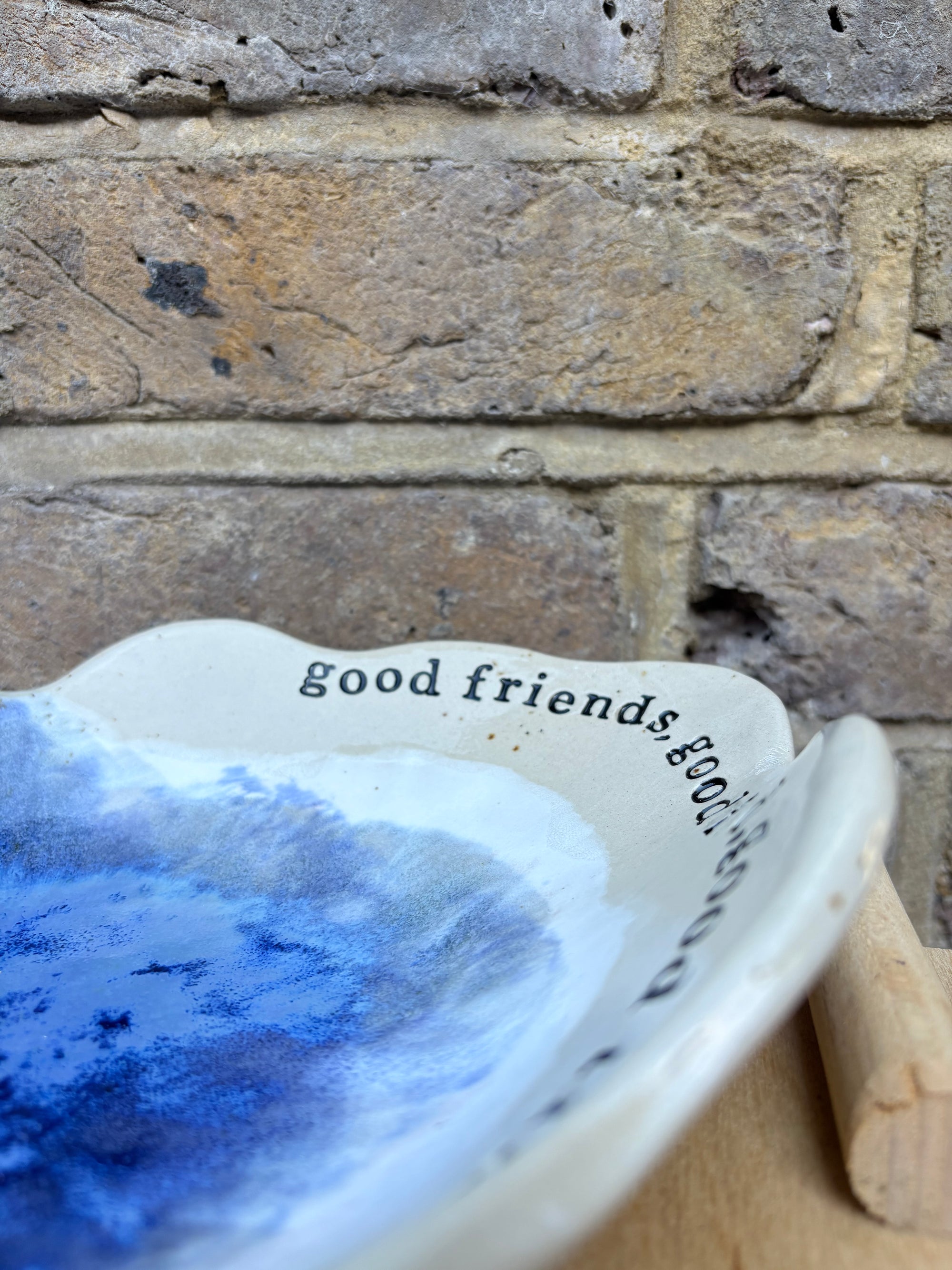 "good food, good wine, good times..." long salad dish