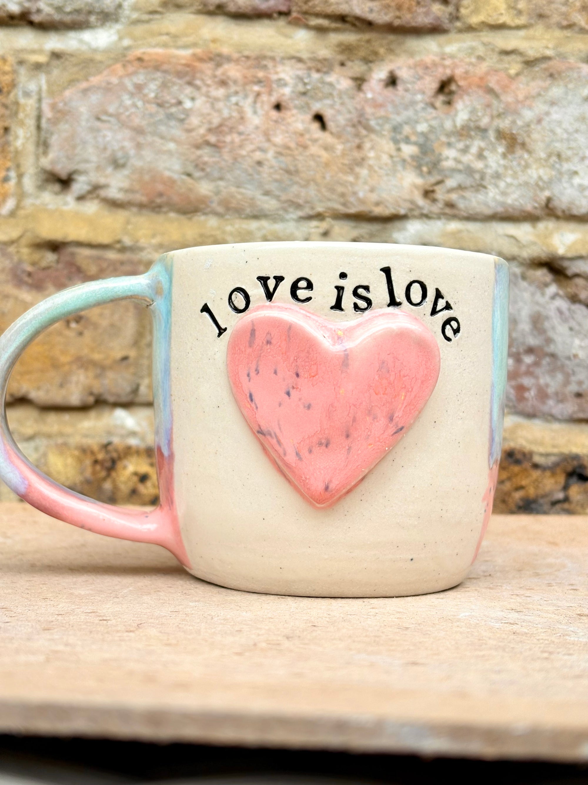 “love is love” mug (pink heart)