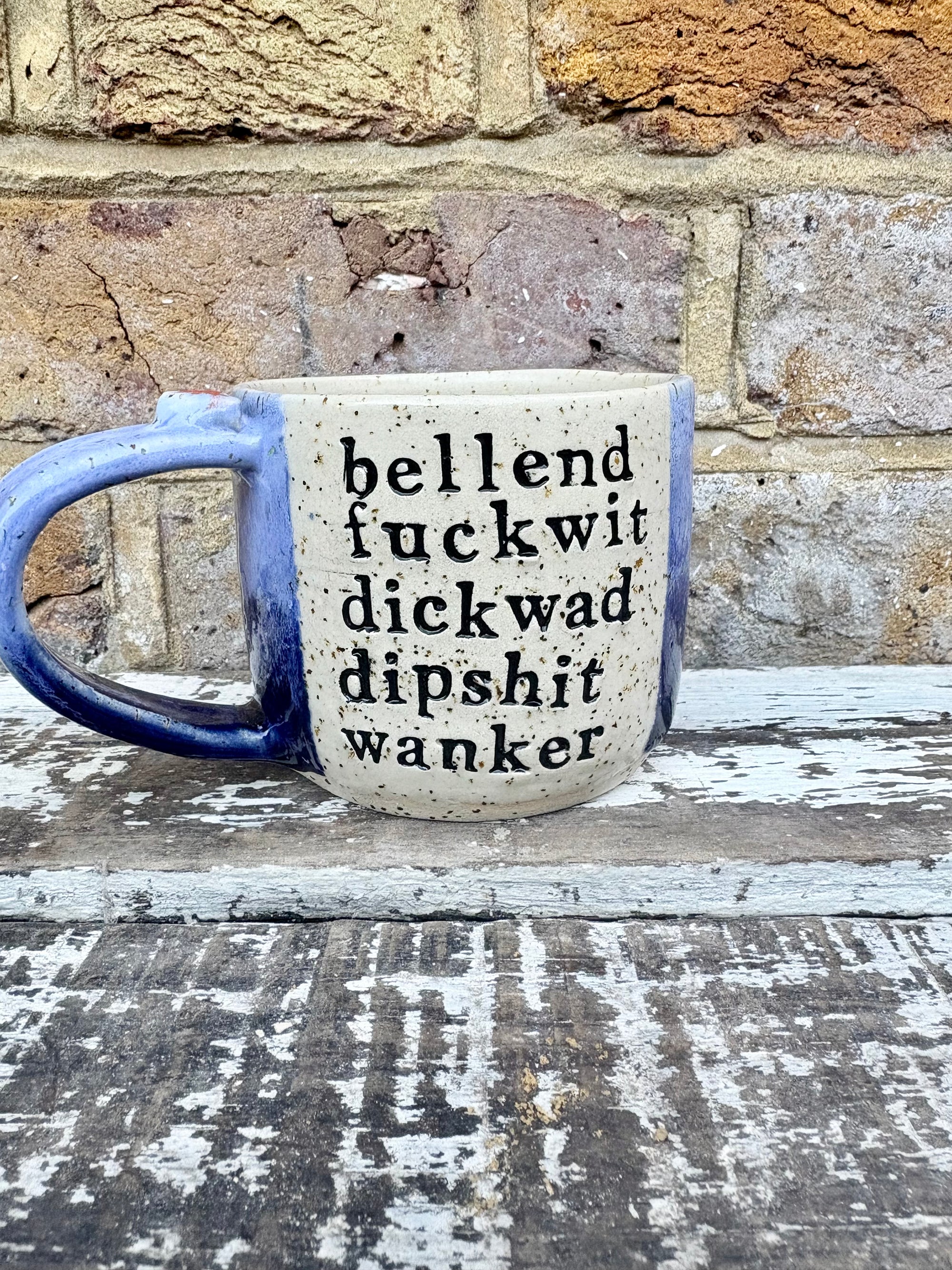 "bellend fuckwit dickwad dipshit wanker" mug (Blues)