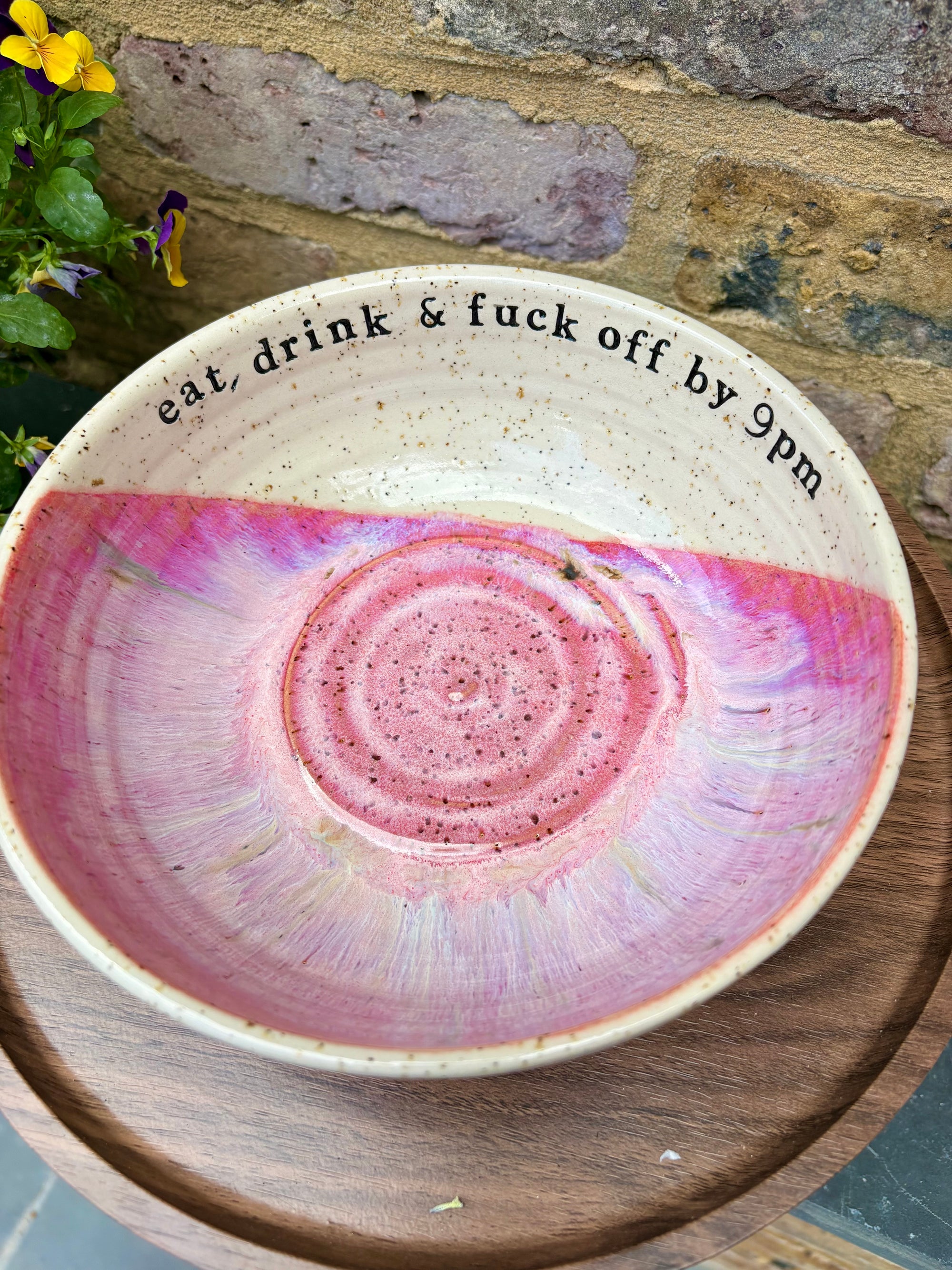 “eat, drink and fuck off by 9pm"  deep round salad/pasta bowl (pink, flecked clay)