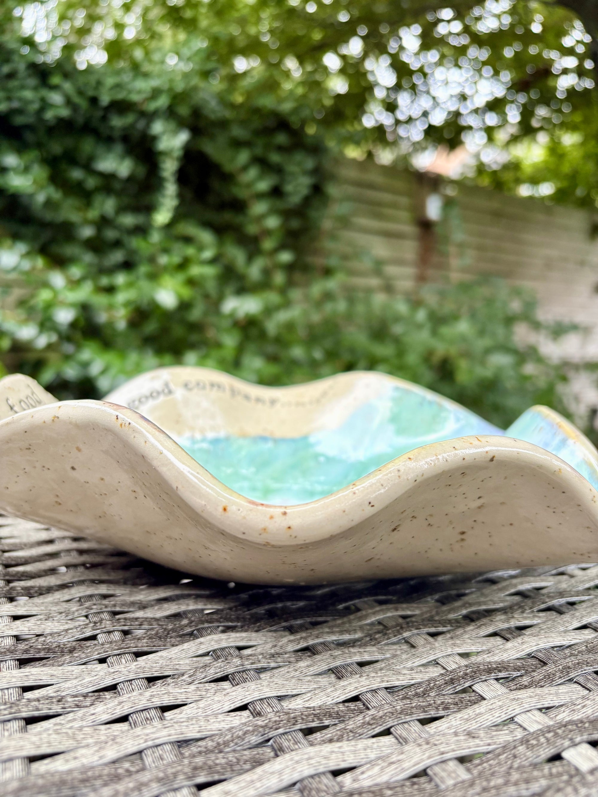 “good food, good wine, good company..." long and deep salad dish