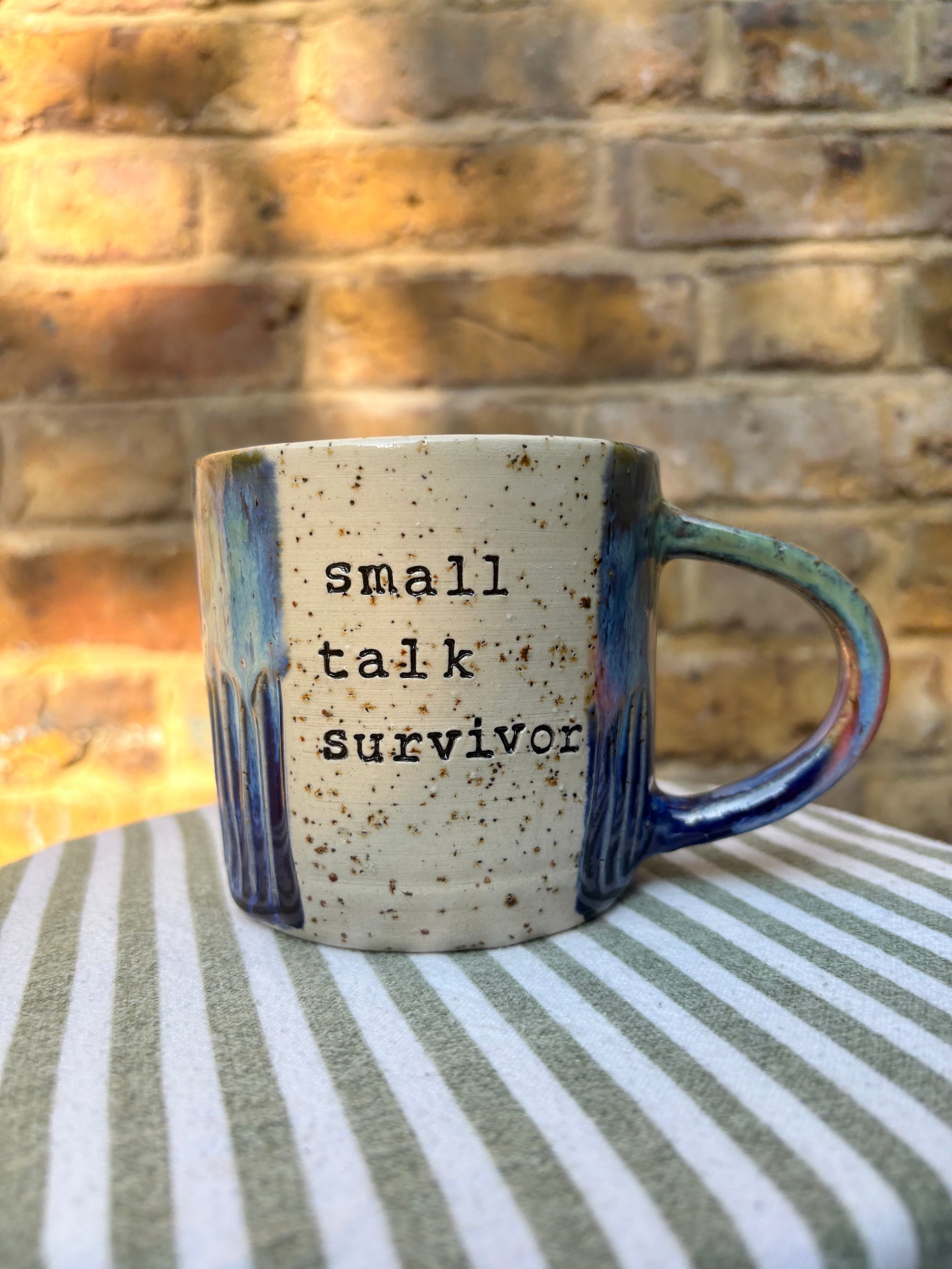 Small Talk Survivor mug (blue)