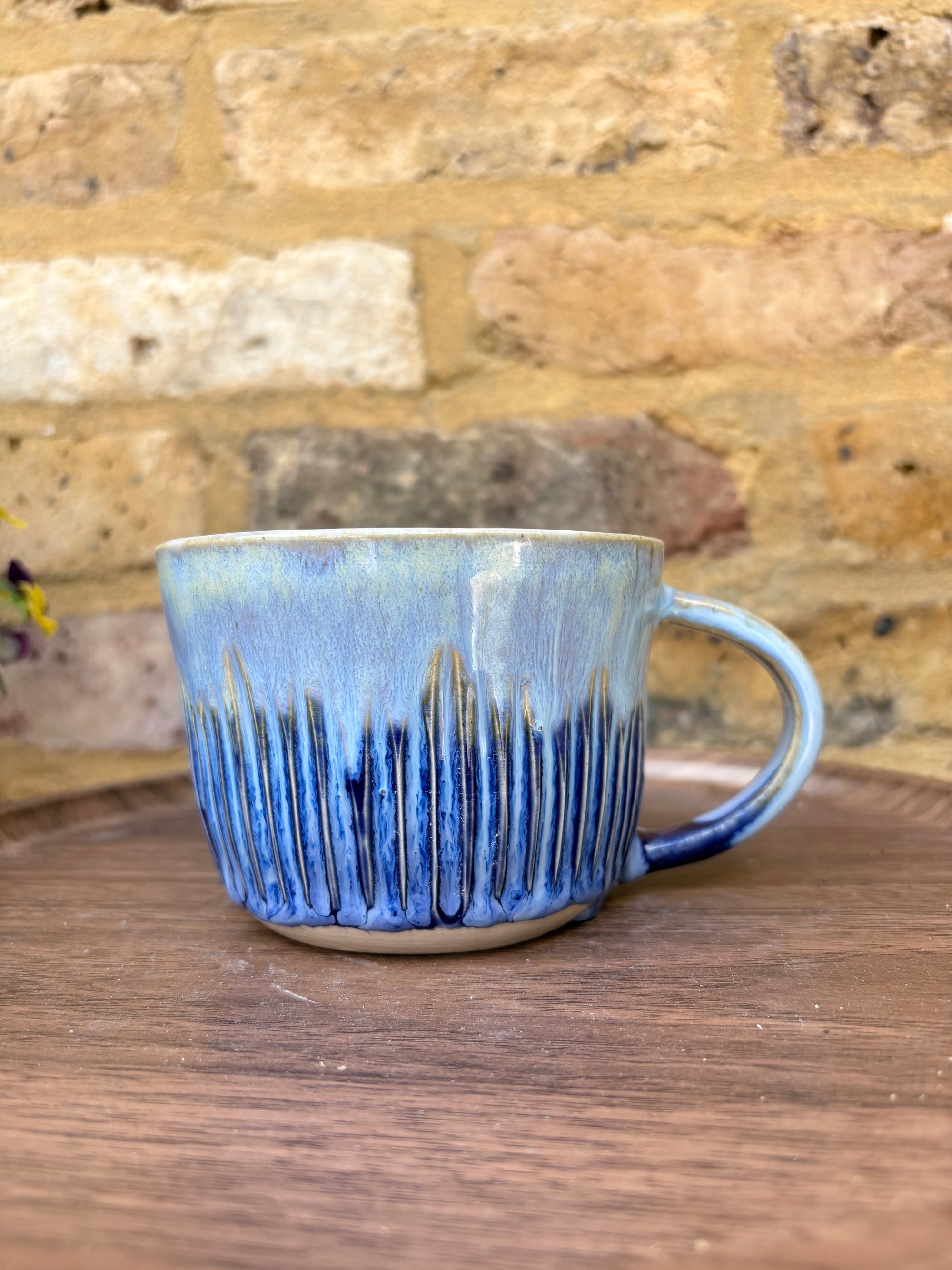 "cunt off fuck face” mug (blue, grooves)