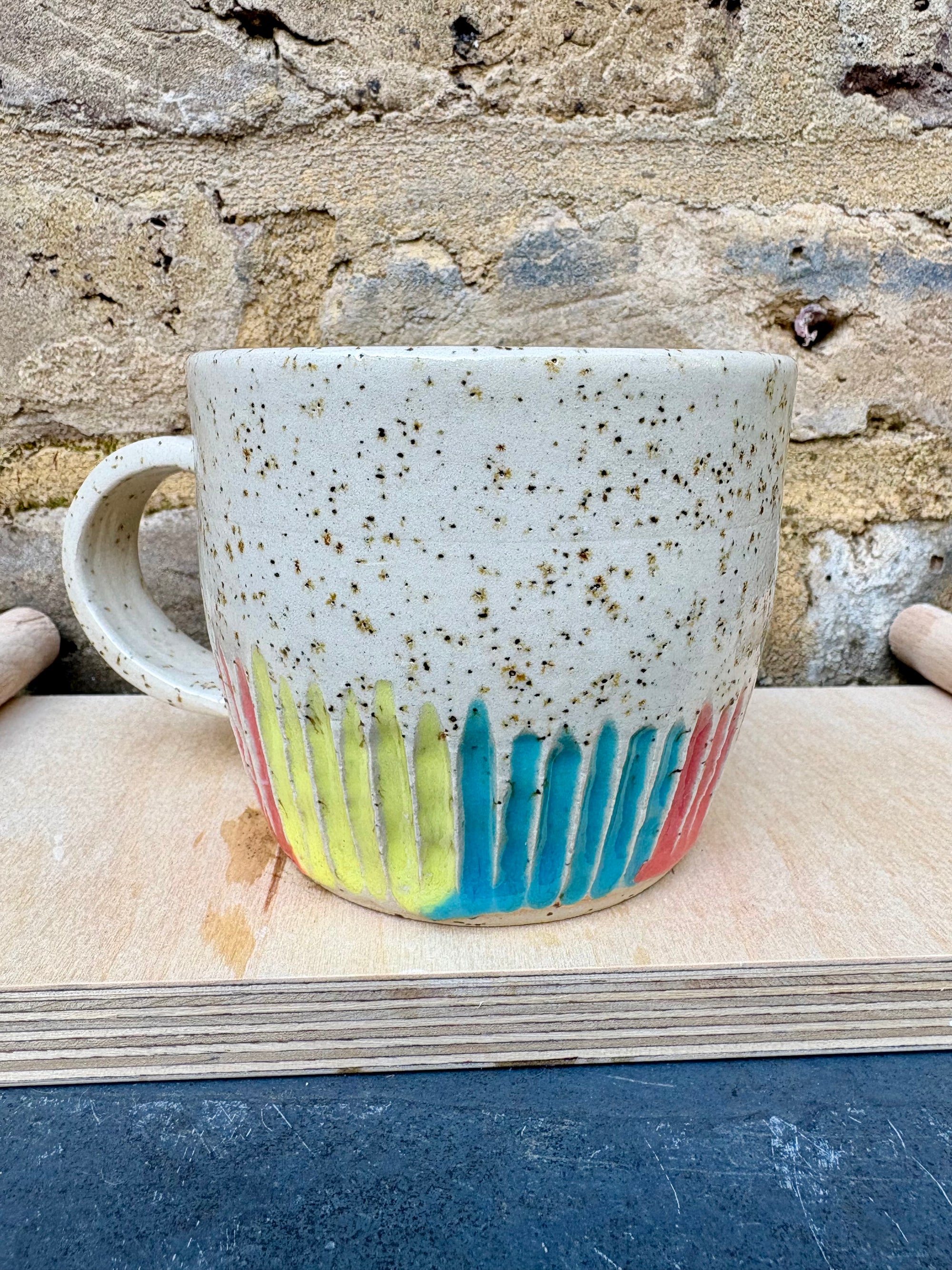 overworked and underfucked mug (multicoloured rainbow grooves)
