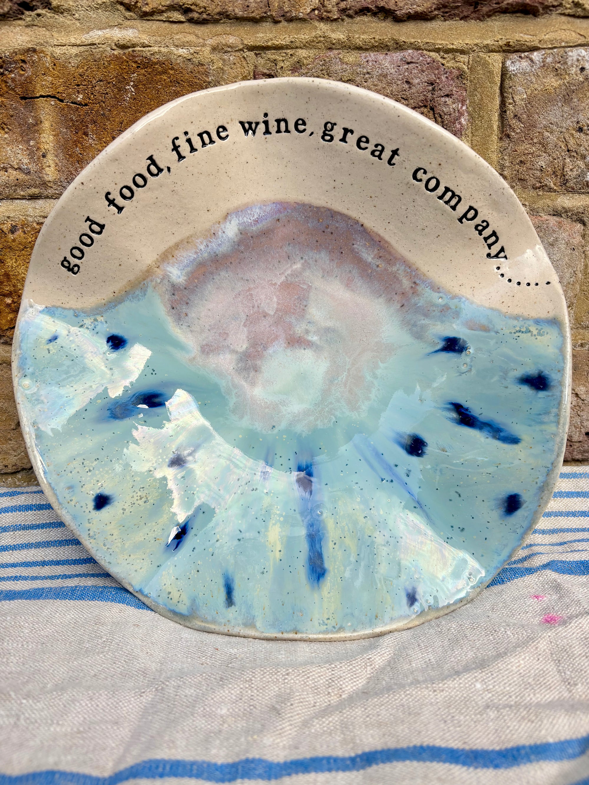 "good food, fine wine, great company..." serving dish